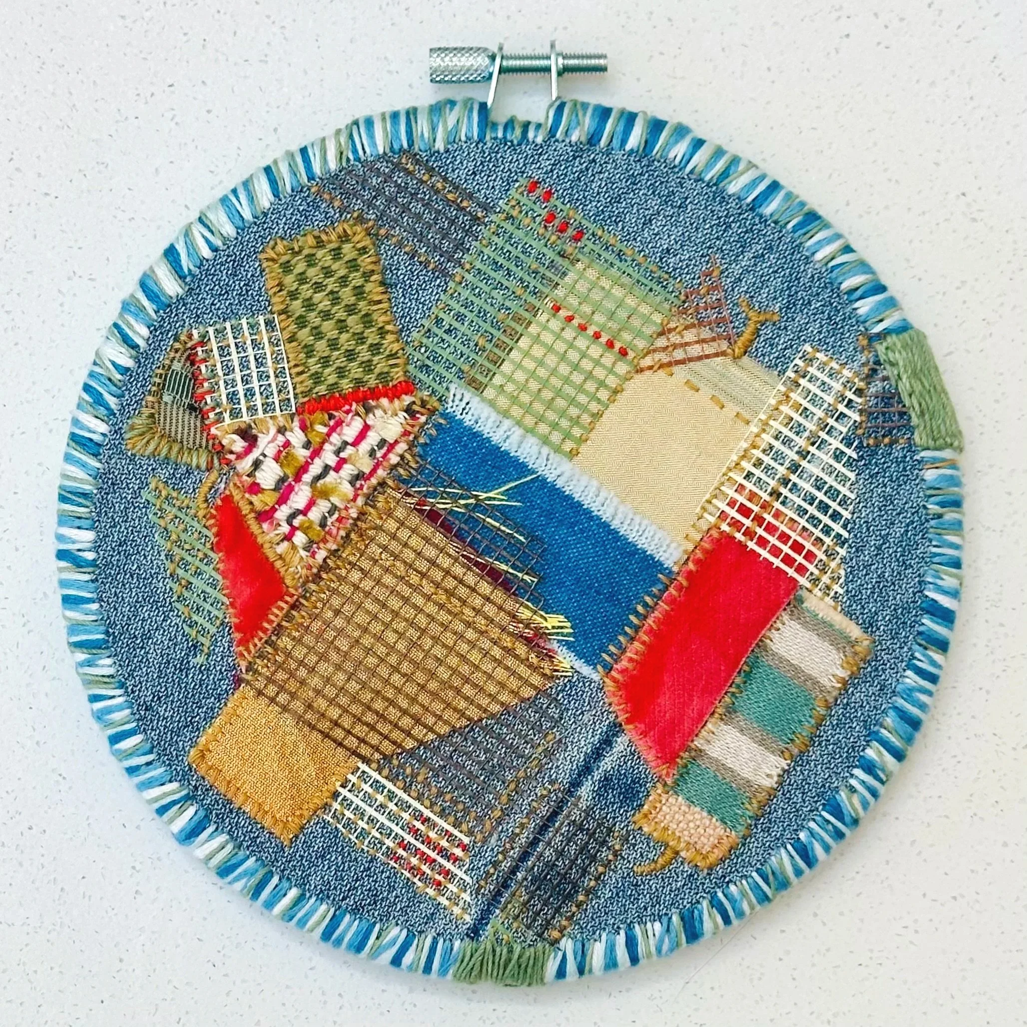 Far Away Memory of Hush (softer than it appears)   (2025)   upcycled fabric, Celsa's old jeans, mesh, Sashiko thread, and embroidery thread  6.5"   $450