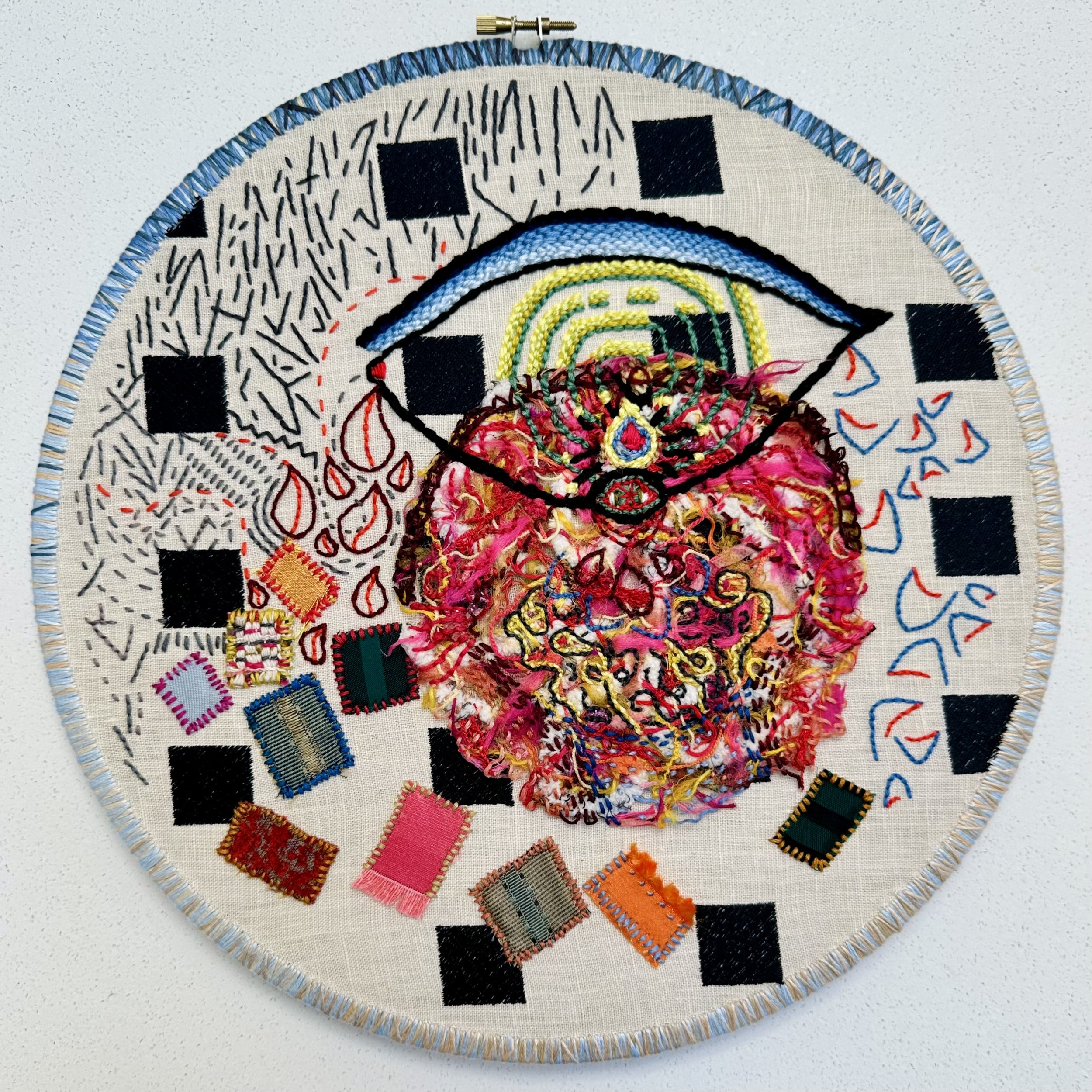 So Much/Too Much Happening (2024) embroidery thread on upcycled fabric 12" disc $