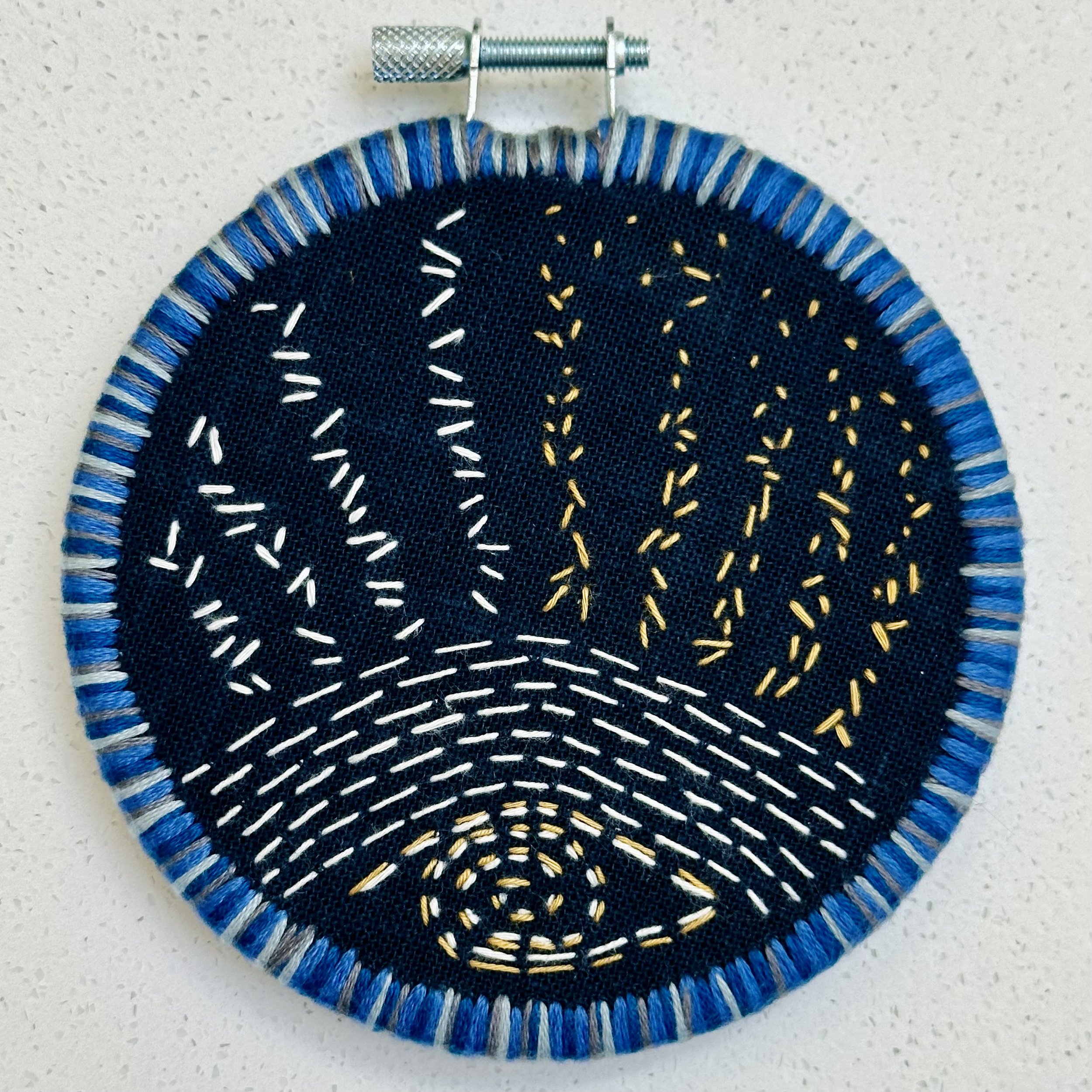 Tiny Echo (from Japan) (2024) Sashiko thread on hand-dyed fabric from Japan 4" disc $