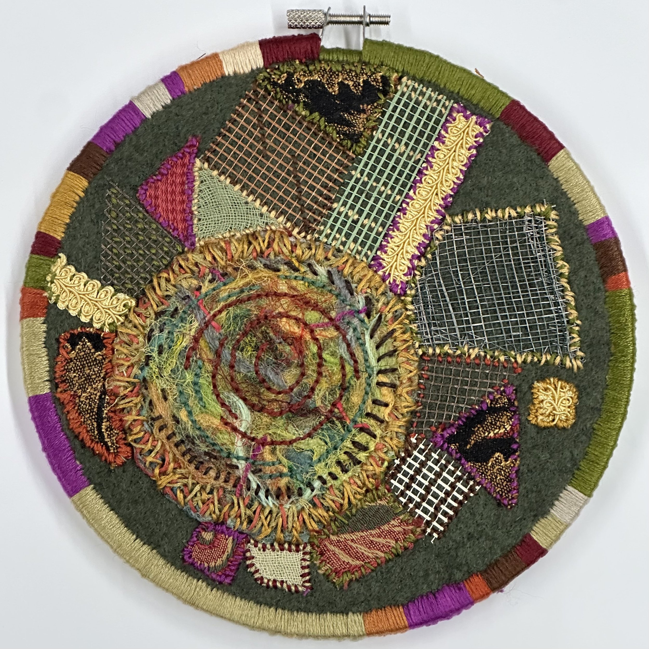 ARC Soup (2023) embroidery thread, trim, and mesh on upcycled fabric and felt 7.5" disc $