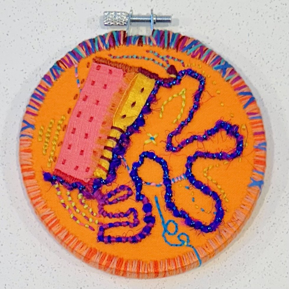 Blip (2024) embroidery thread on upcycled fabric 4.5" $