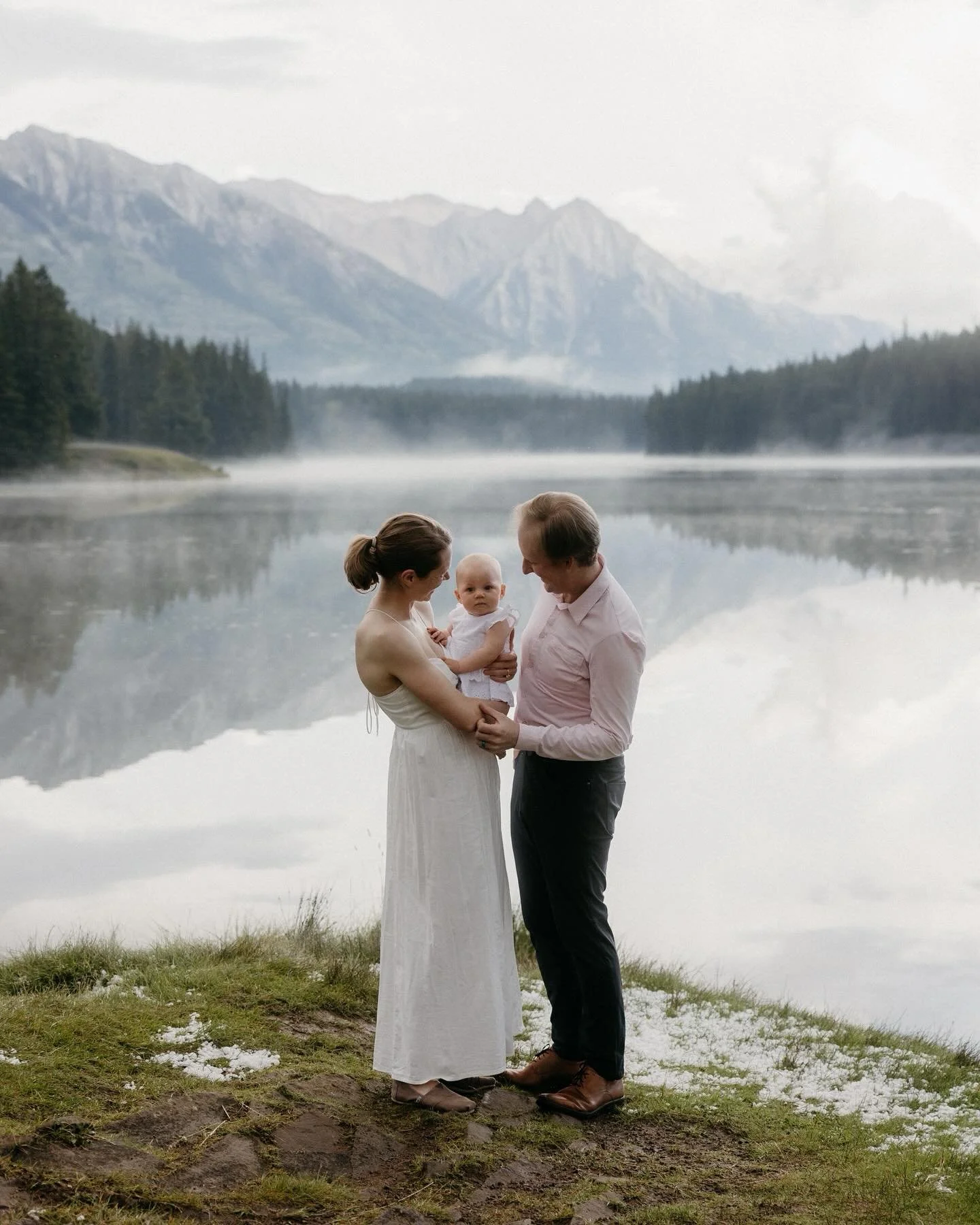 This moody summer we&rsquo;ve been having in the Canadian Rockies has been making for some pretty cinematic portraits. Caitlyn, Chris and baby Audrey: thank you for braving the rain, the hail, and the wind with me last week.