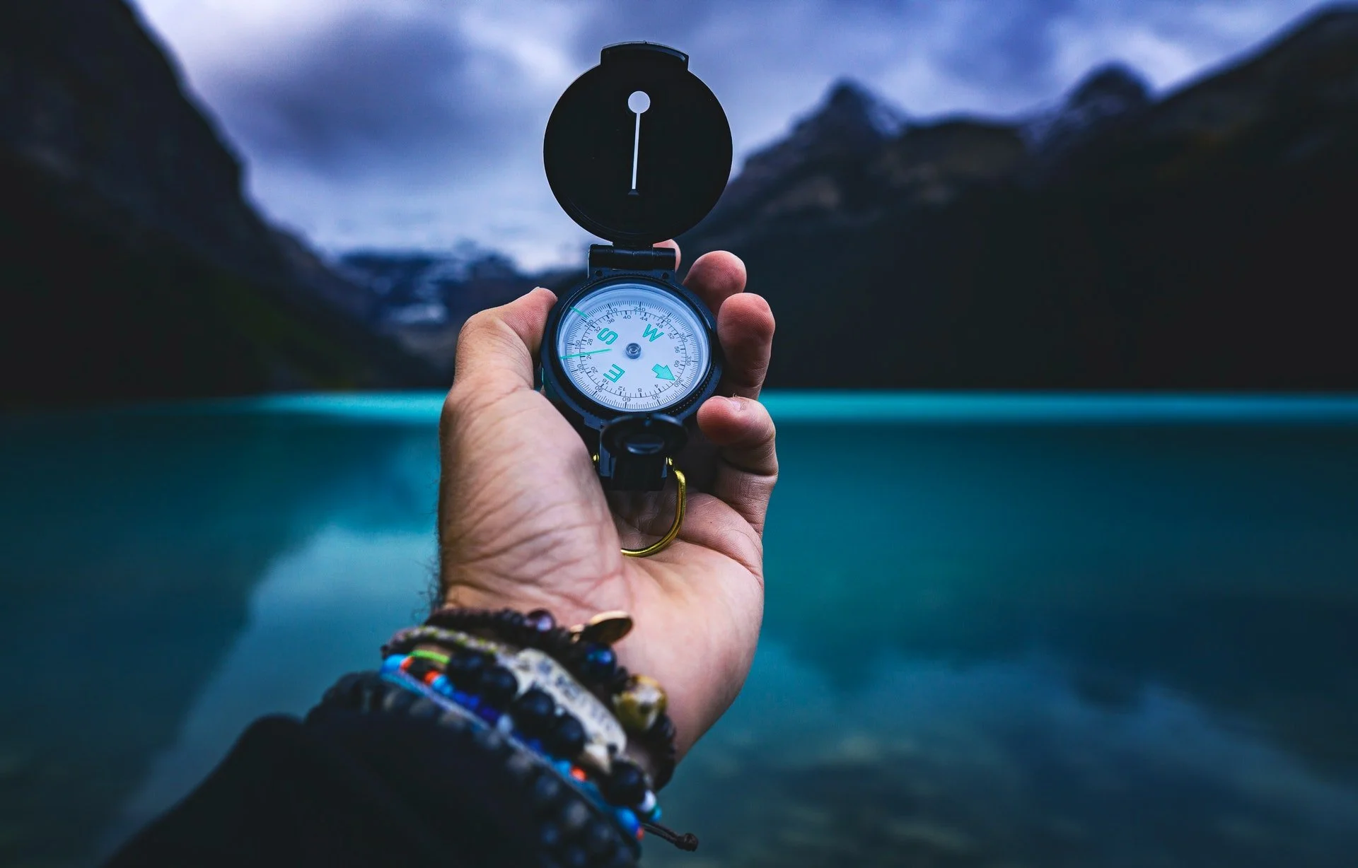 Man uses a compass to find his values