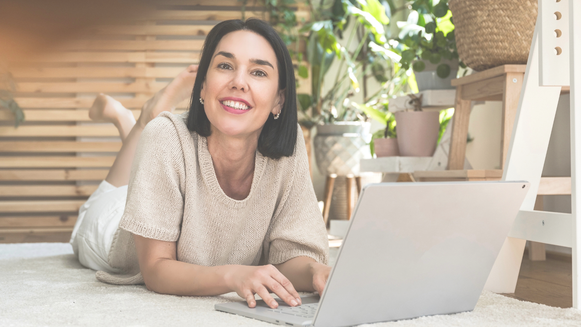 An elegant close-up portrait of Verena, founder of Healju Hub, offering transformative 1:1 online astrology mentoring and somatic energy work.