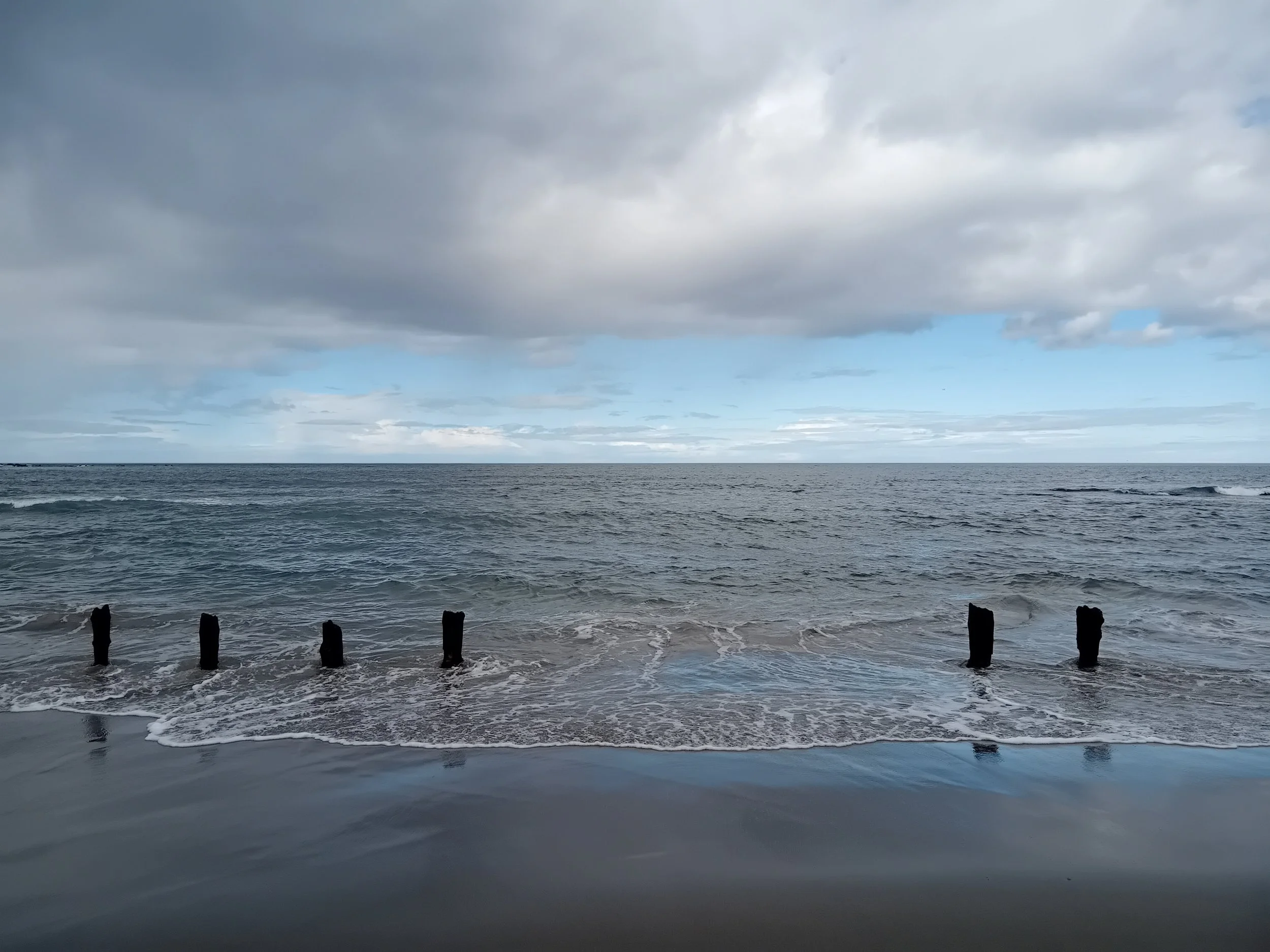 'The Twelve Apostles, Gardenstown Beach, Aberdeenshire' by Britta Benson