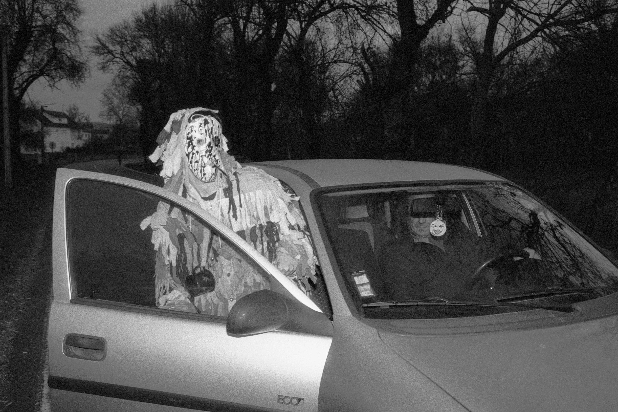 'Masked Man Getting Into a Car' by Paulo Monteiro