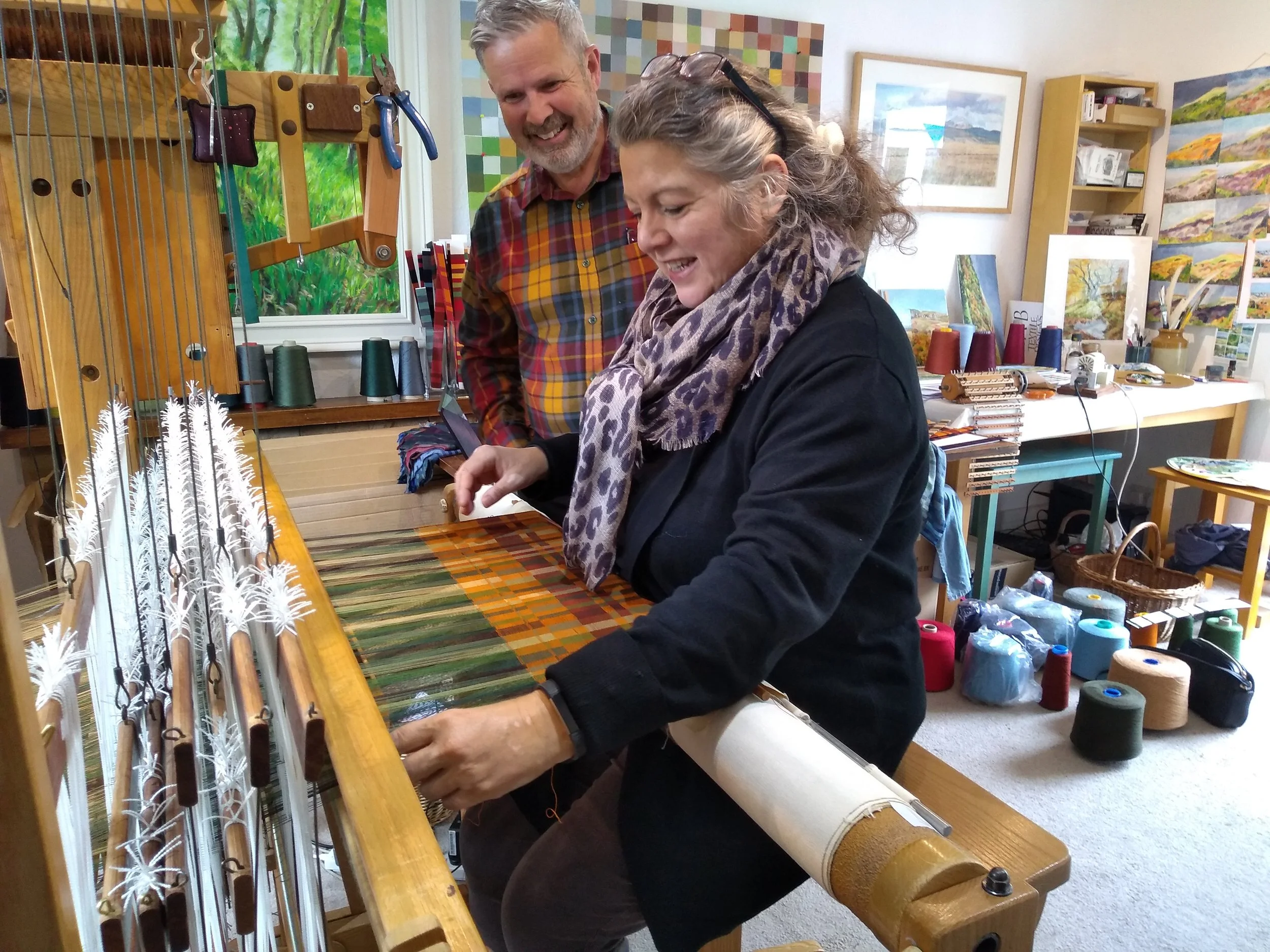 Visitors try silk weaving in Katherine Cowtan’s studio - Katherine Cowtan