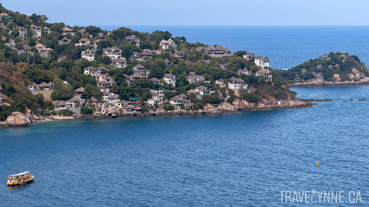Houses and small hotels dot the jungle on a peninsula in Koh Tao, Thailand