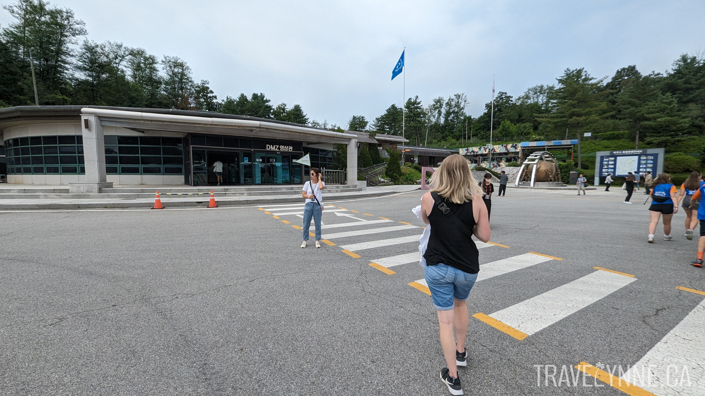 A DMZ tour building and parking lot