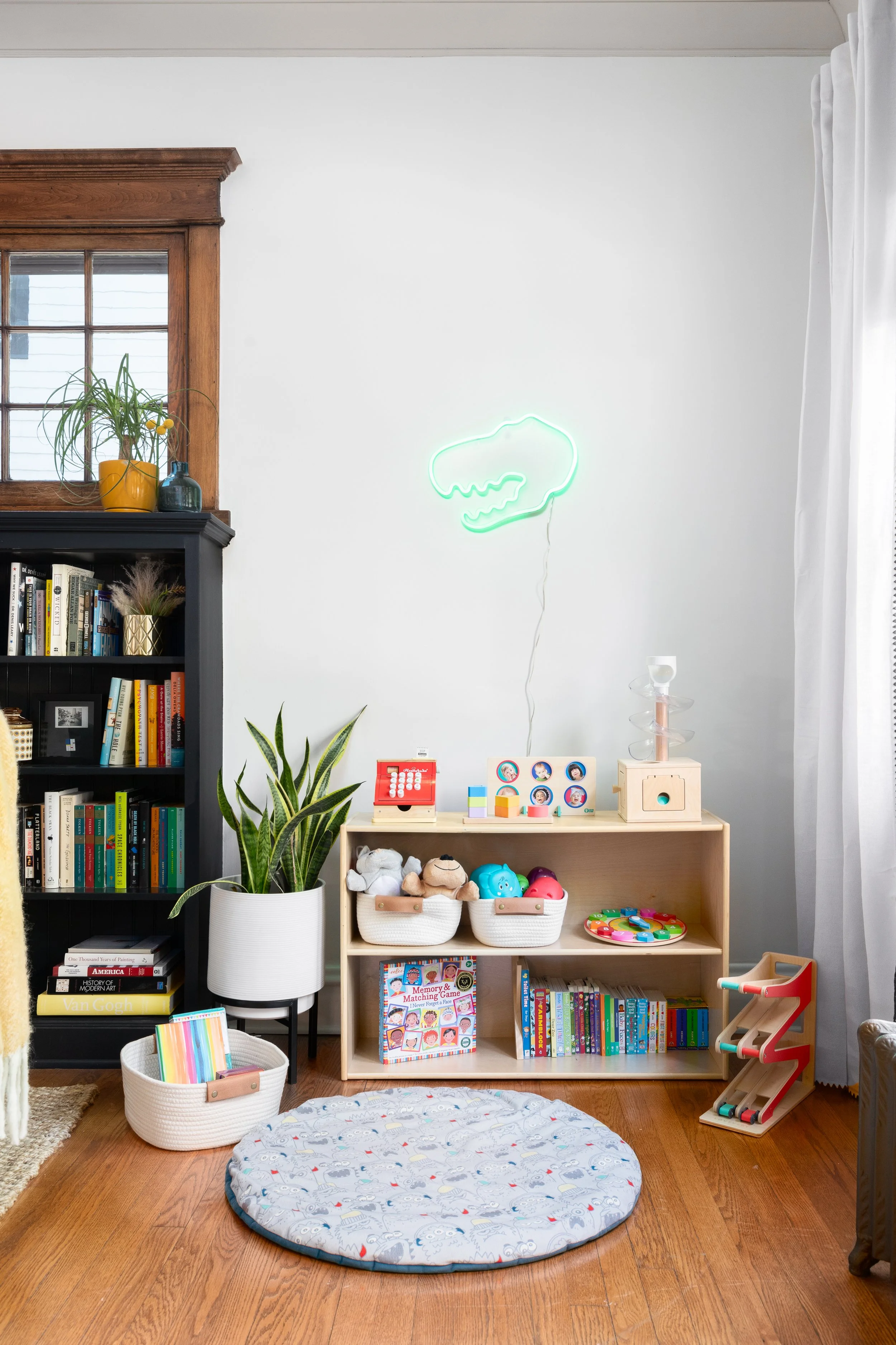montessori style play area dinosaur light