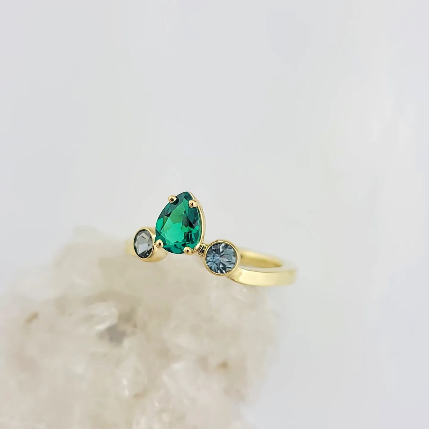 Just finished up this 18K yellow gold, man-made emerald and Montana sapphire bespoke ring! Love the way green and gold go together! #bespoke #ring #emerald #montana #sapphire #18k #gold