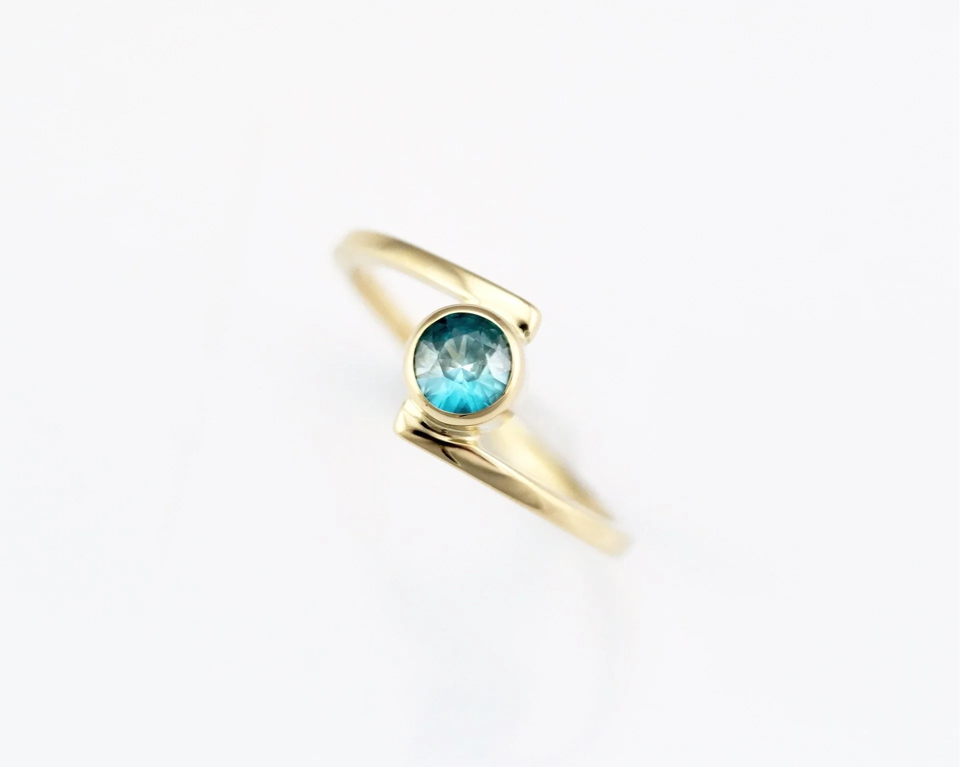 14KY+Blue+Zircon+Orbit+Ring.jpg