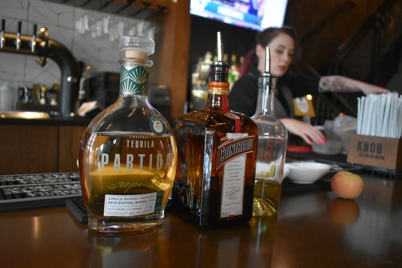 Margarita ingredients, including a sage simple syrup