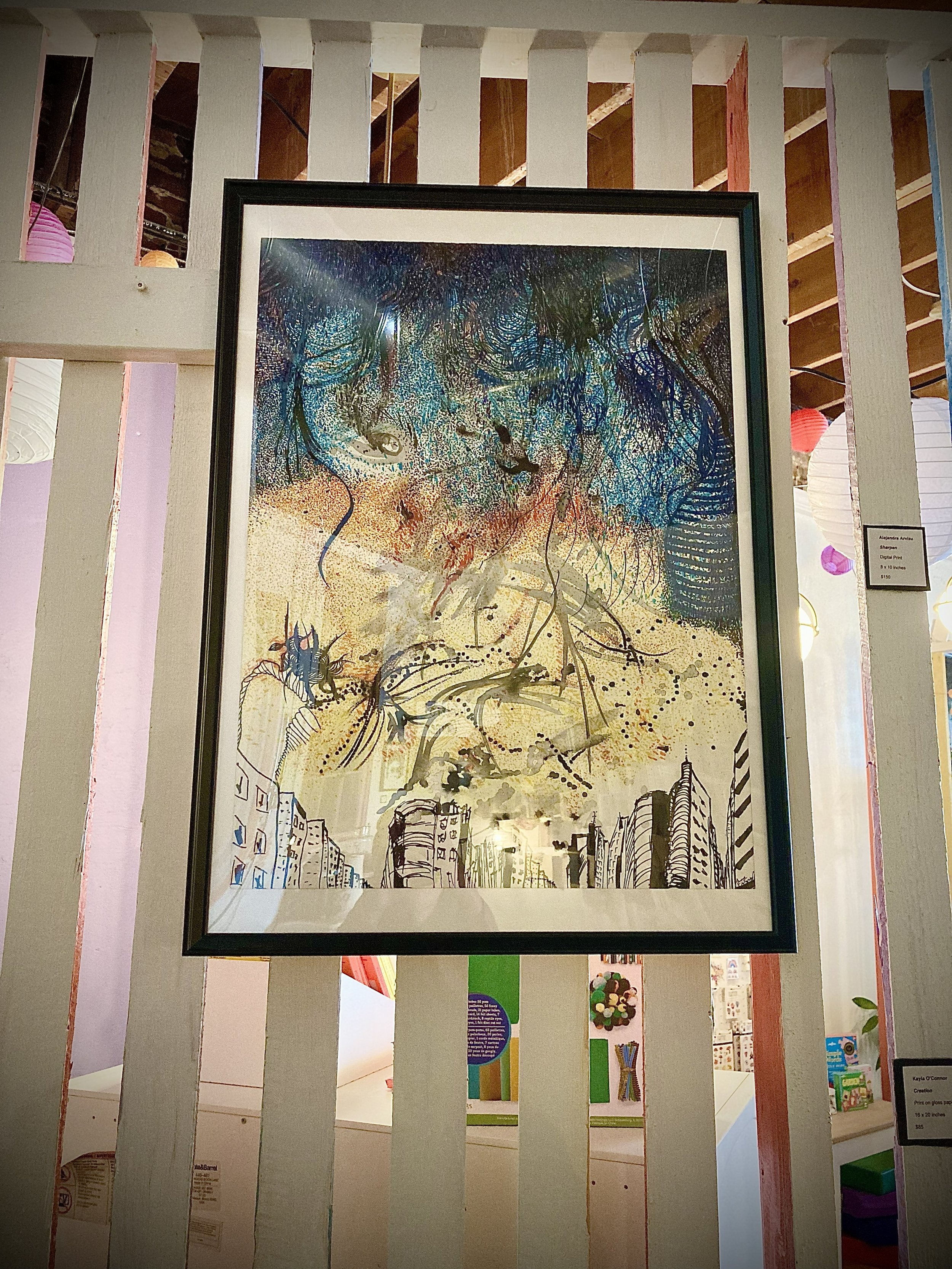Large artwork on white wood slate wall 