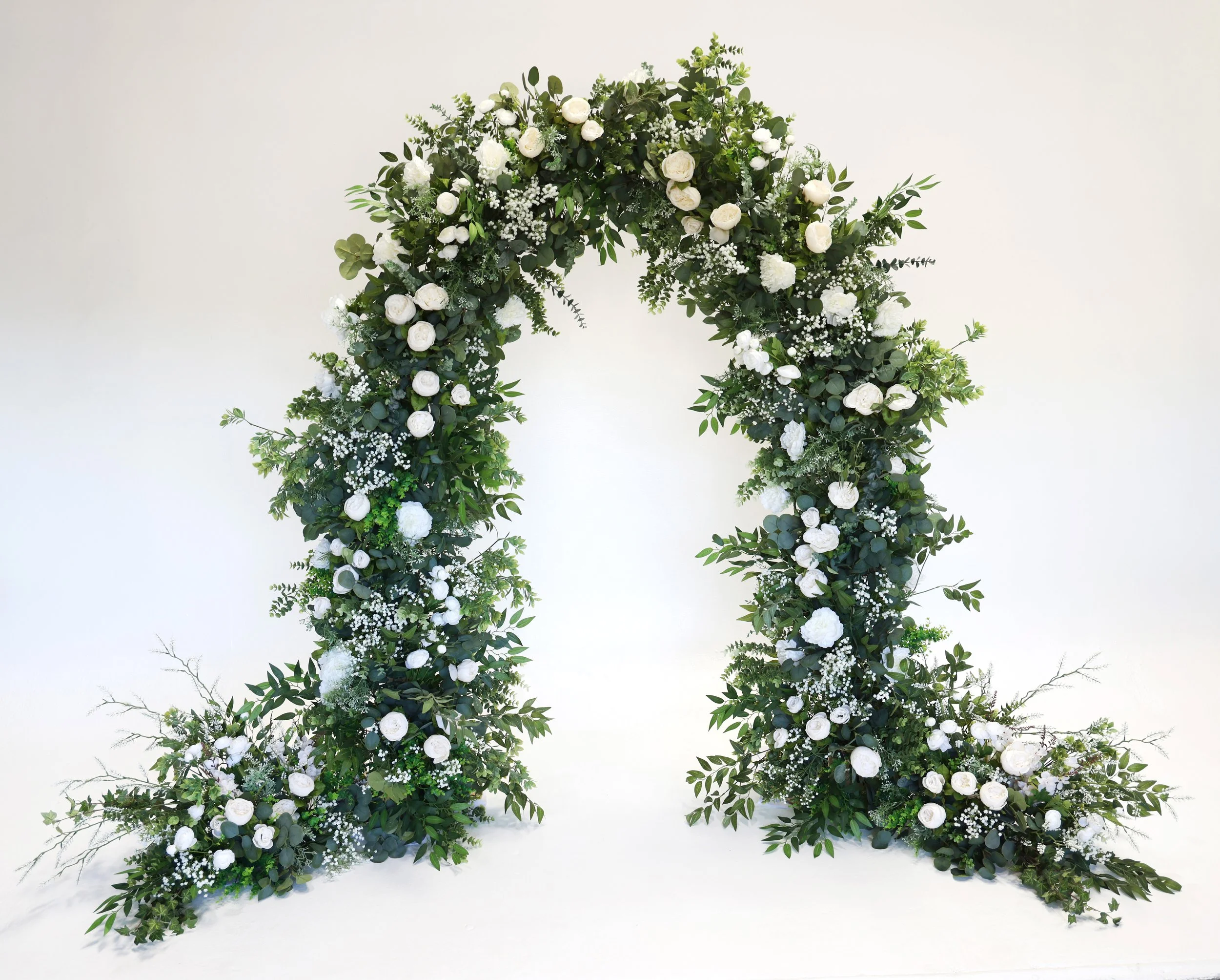 Greenery and white floral arch