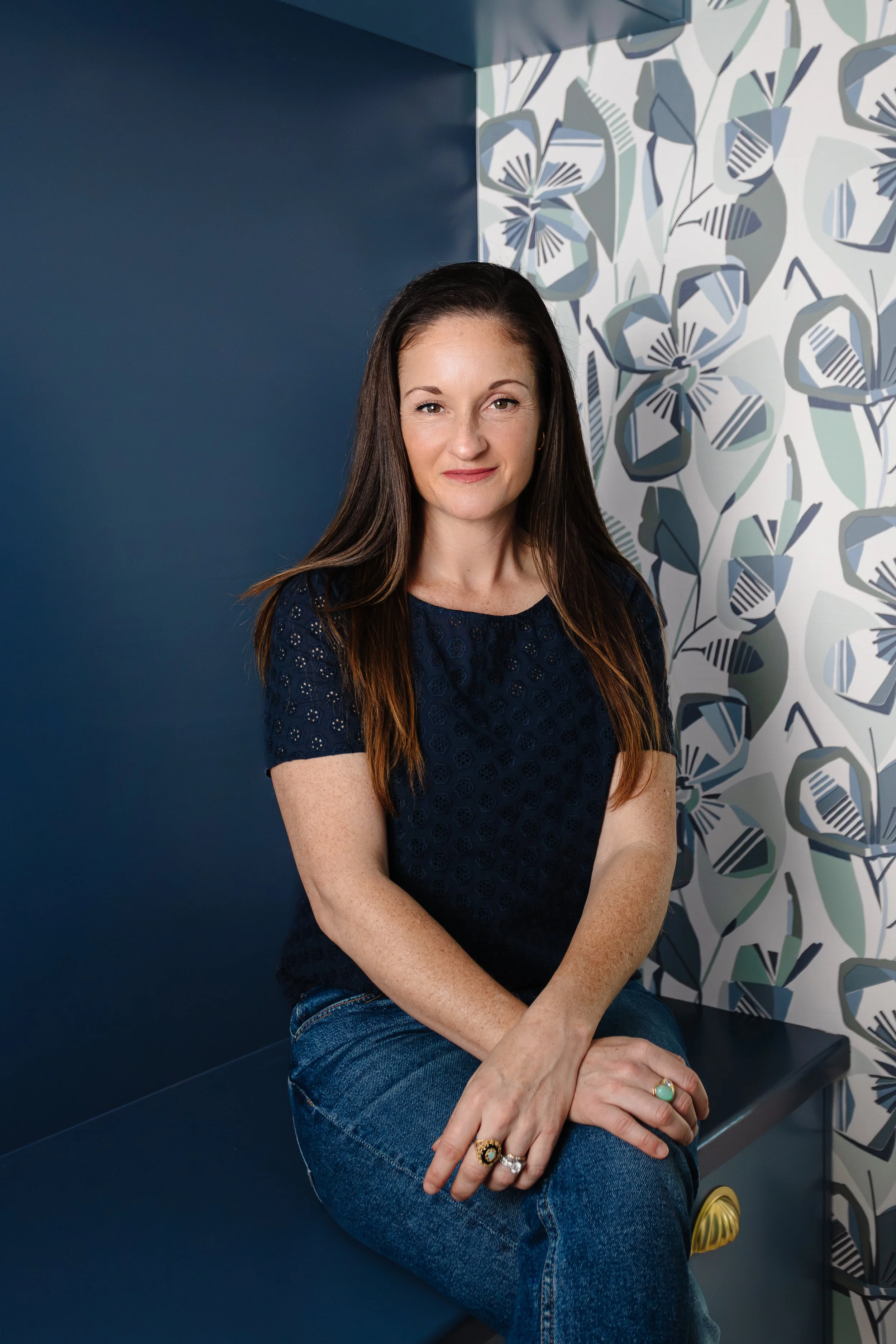 Erin Glueck is a Sarasota, Florida–based interior designer and co-founder of Eridel Construction & Design, specializing in luxury residential design, new construction, and renovations, known for creating bespoke, timeless interiors.