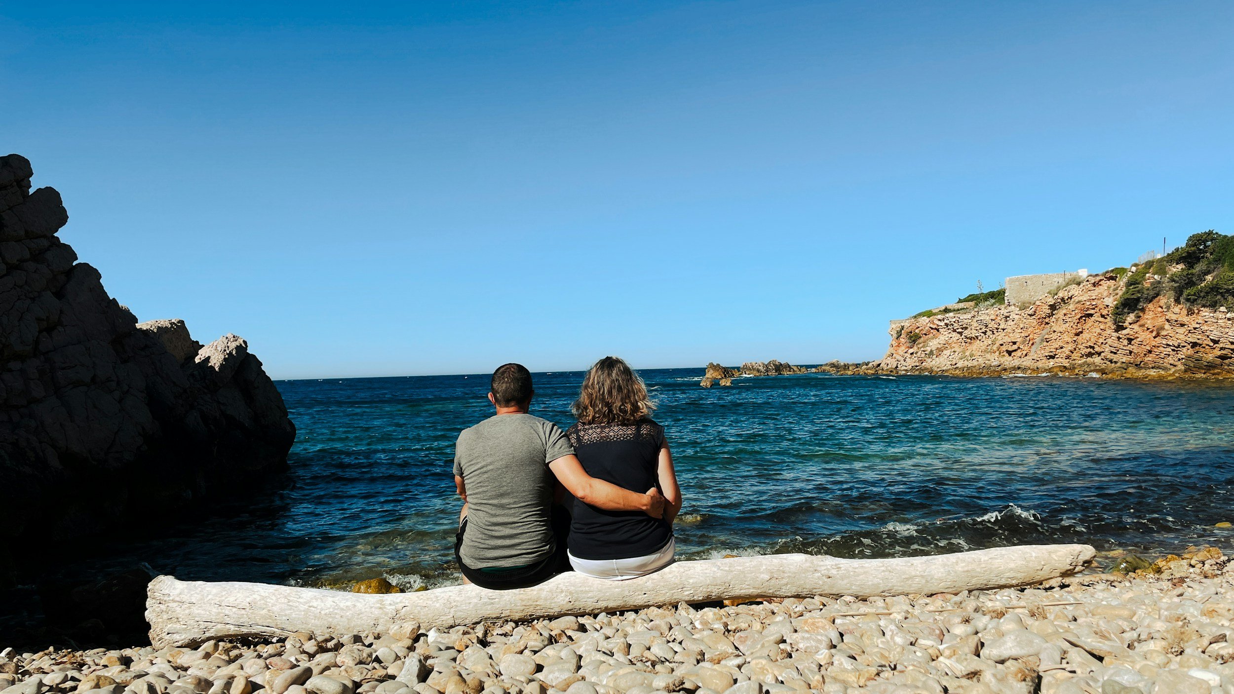 Couple reflecting together after completing an intensive couples therapy experience and follow-up plan