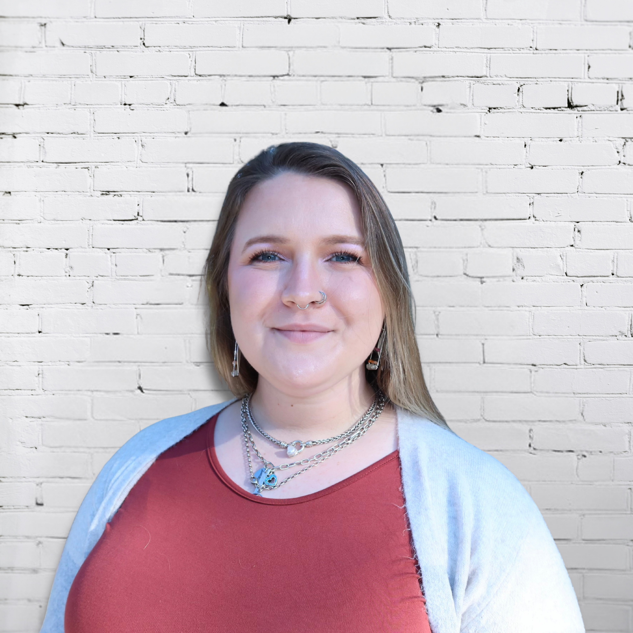 Headshot of Genevieve Savage, a Licensed Clinical Social Worker specializing in art therapy and child counseling in St. Petersburg, Florida