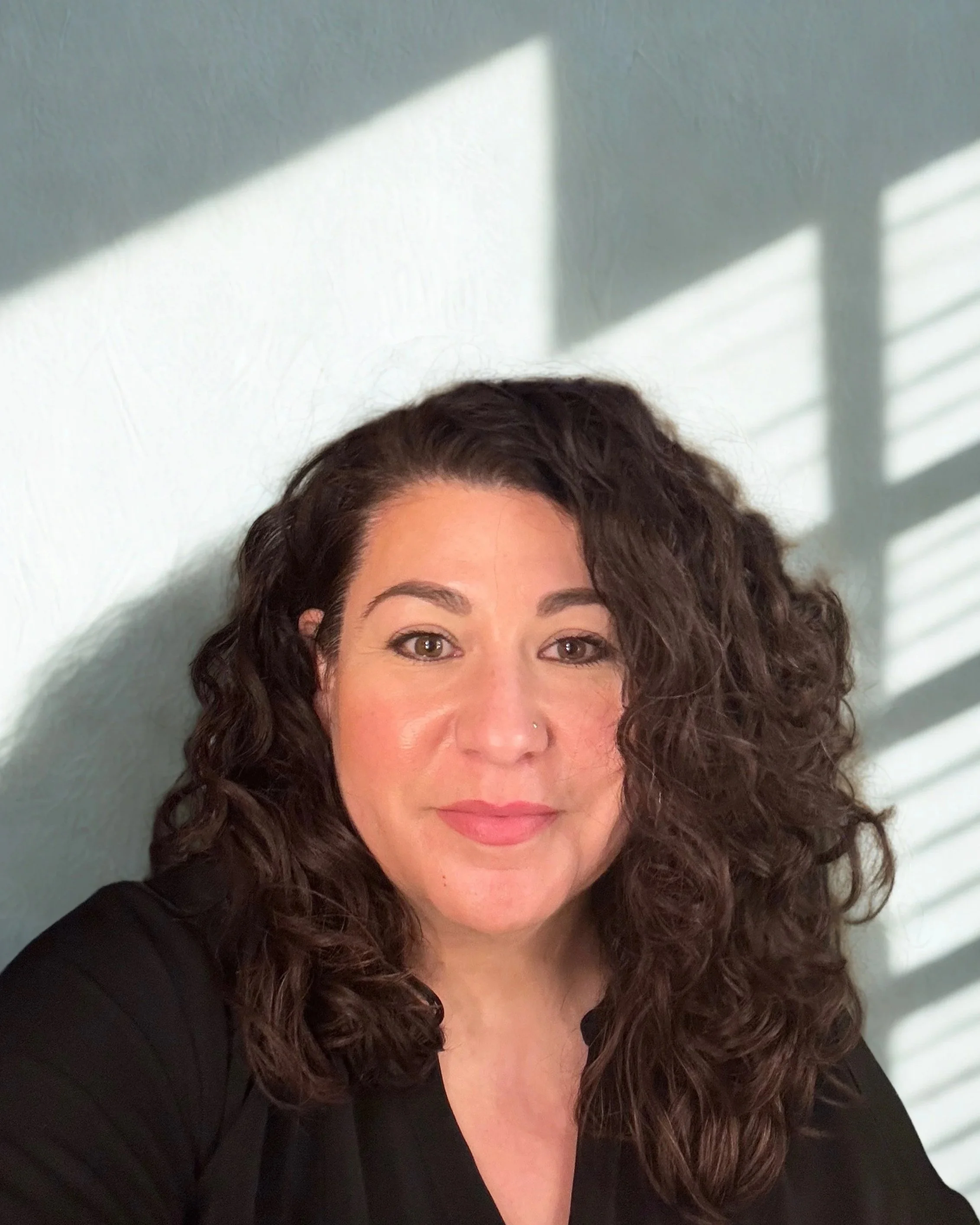 photo of Elie's face, a woman with dark hair and features.