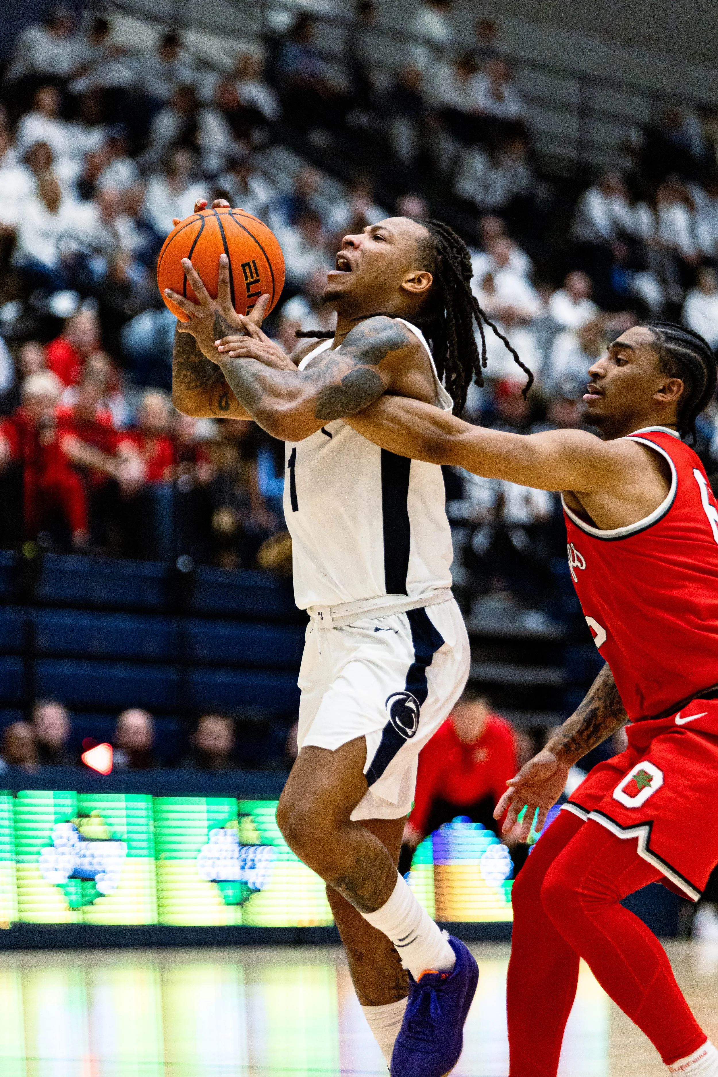 Penn State's Ace Baldwin (1) tries going up for the layup but it fouled by Ohio State on January 30, 2025..jpg