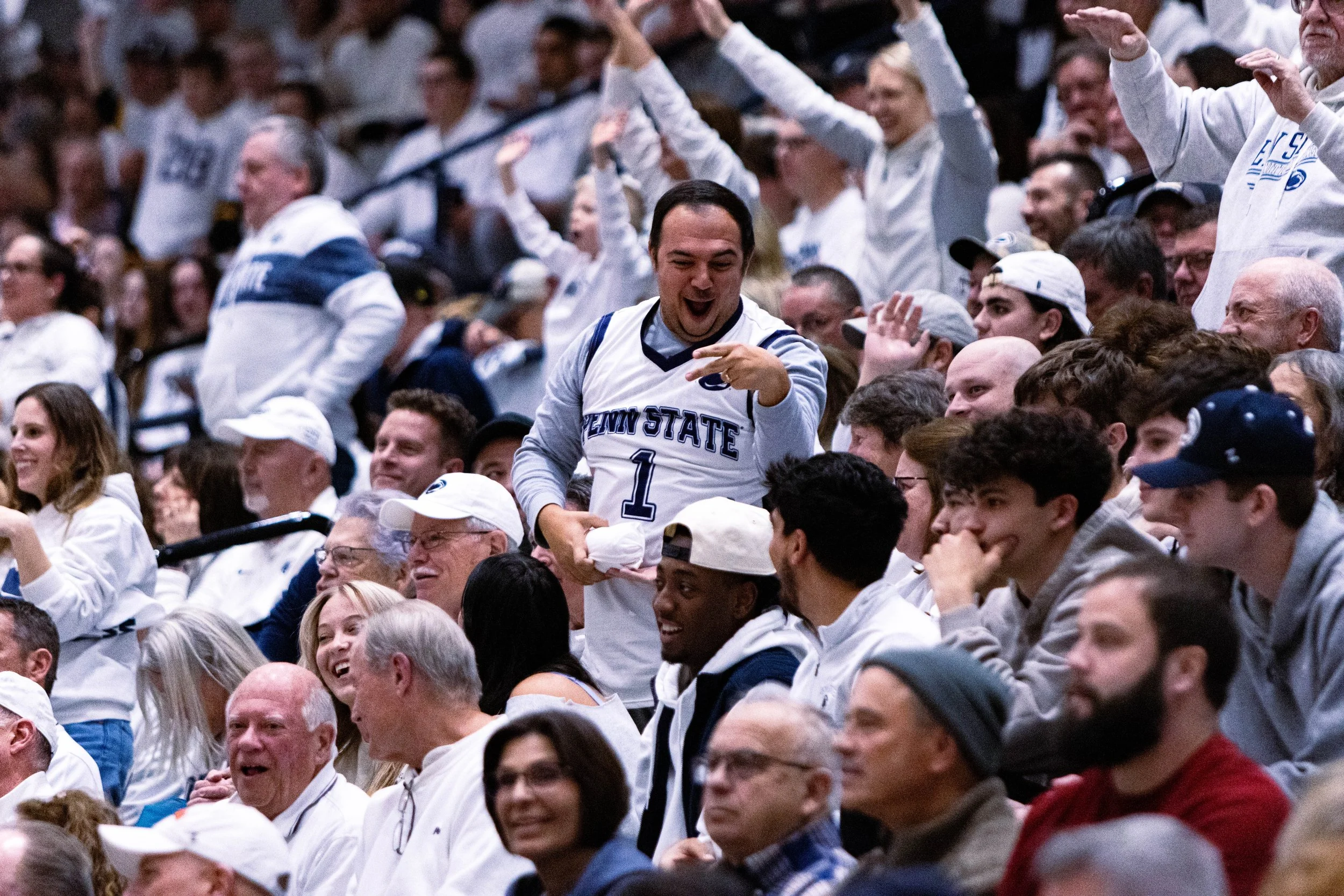 Penn State's fan receives t-shirt from the cheerleaders on January 30, 2025..jpg