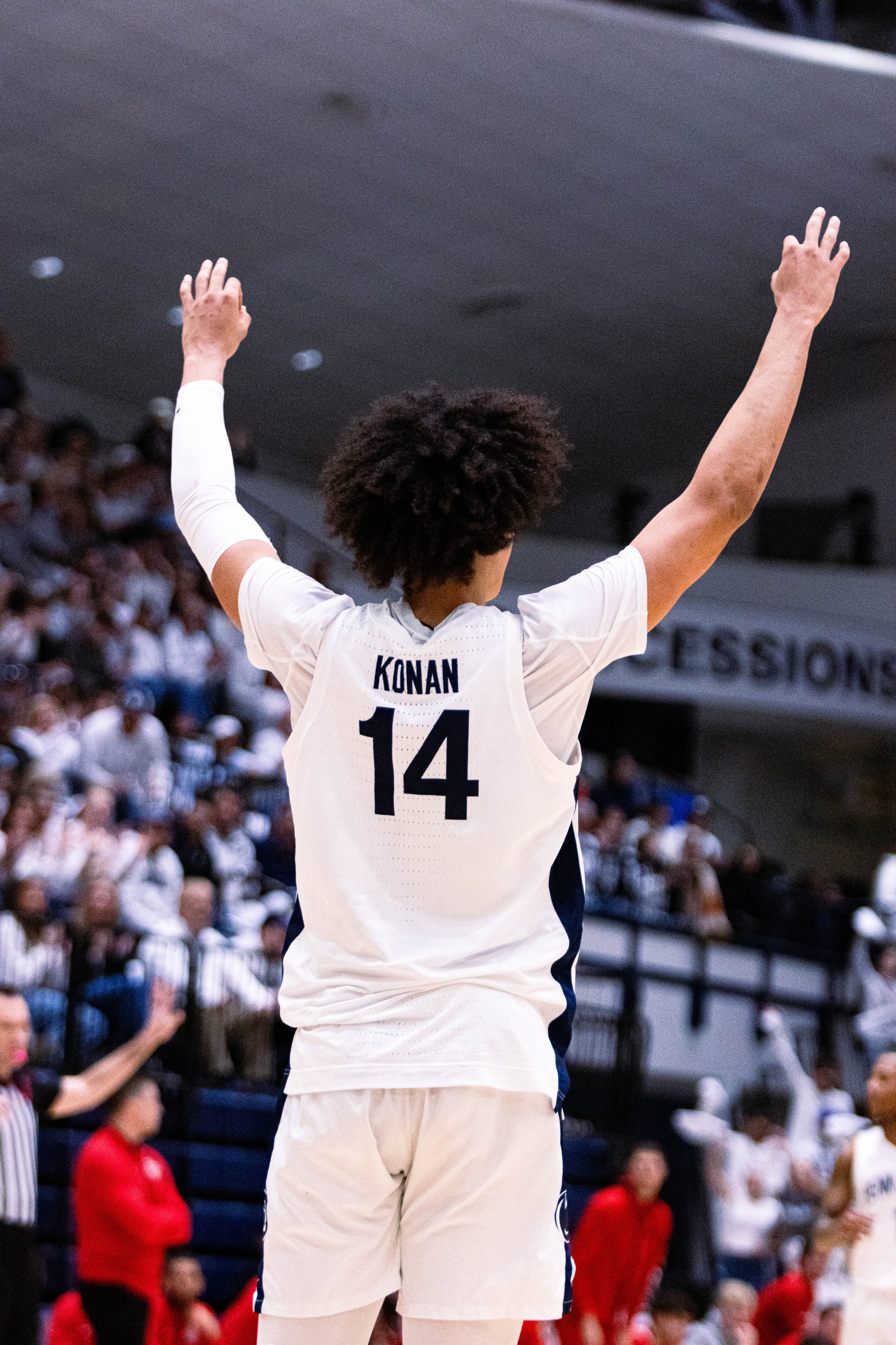 Penn State's Yanic Konan Niederhauser (14) celebrates his teammate three pointer against Ohio State on January 30, 2025..jpg