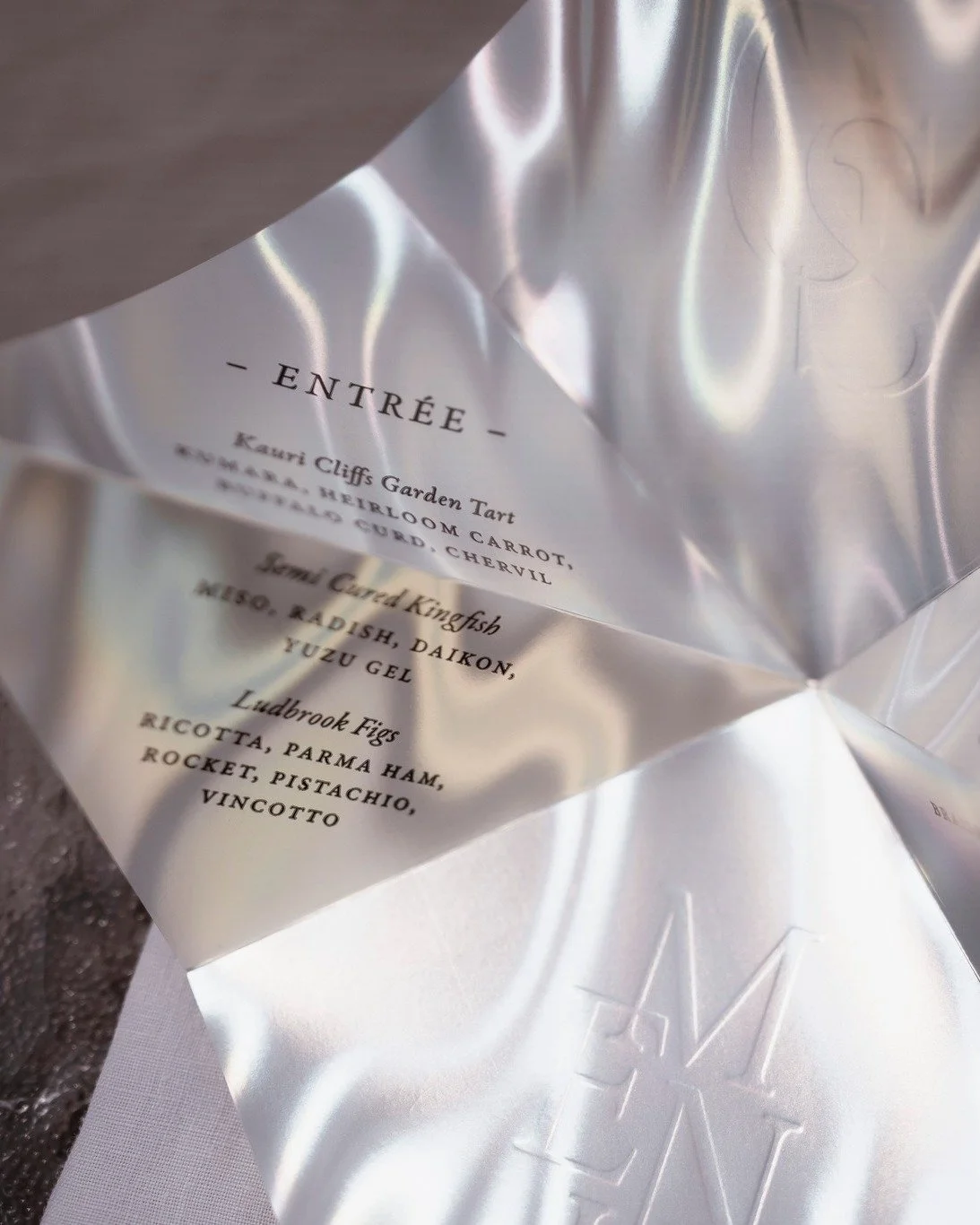 Stunning details with @alexandrakatecreative. Custom letterpress menus on the coolest holographic paper!! I have been itching for someone brave enough to run with this idea and this was the perfect brief ✨
~
Planning &amp; production @alexandrakatecr