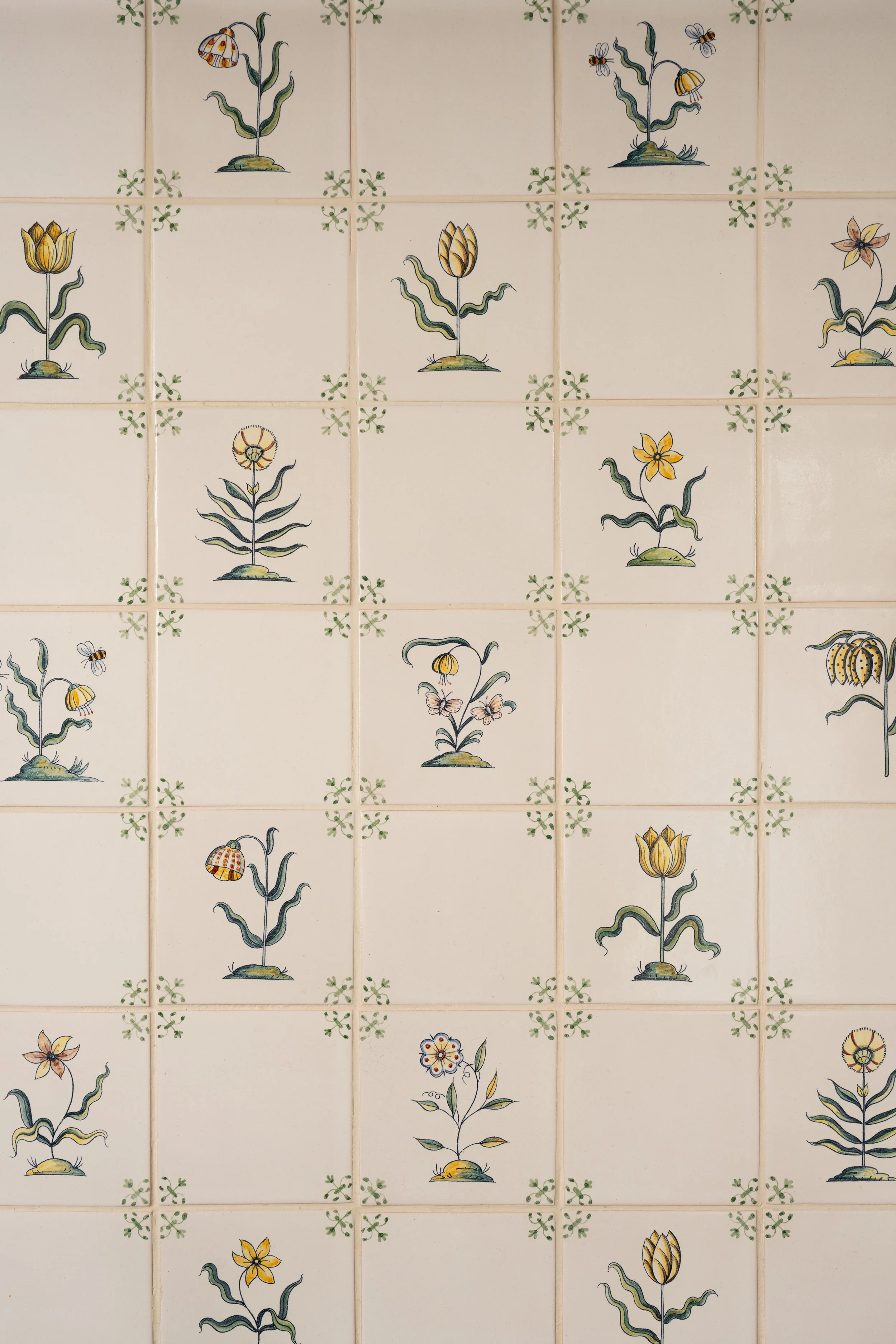 Hand painted tile backsplash detail english cottage style.