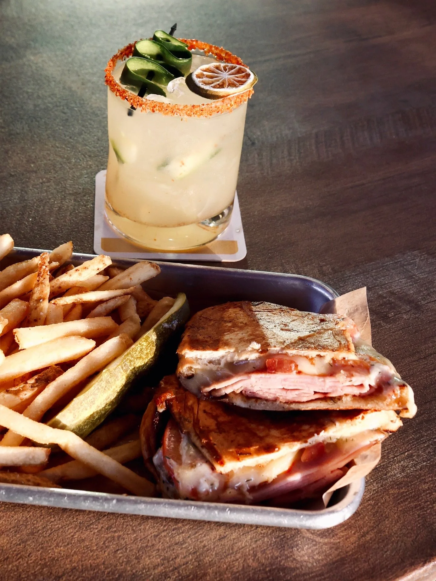 🎉 Introducing our new Munchie &amp; Cocktail of the month!

🔥 Savor the flavors of our &ldquo;Hot Off The Press&rdquo; panini- featuring black forest ham, tomato, applewood smoked bacon, dill aioli and swiss cheese. Served with a pickle &amp; side 