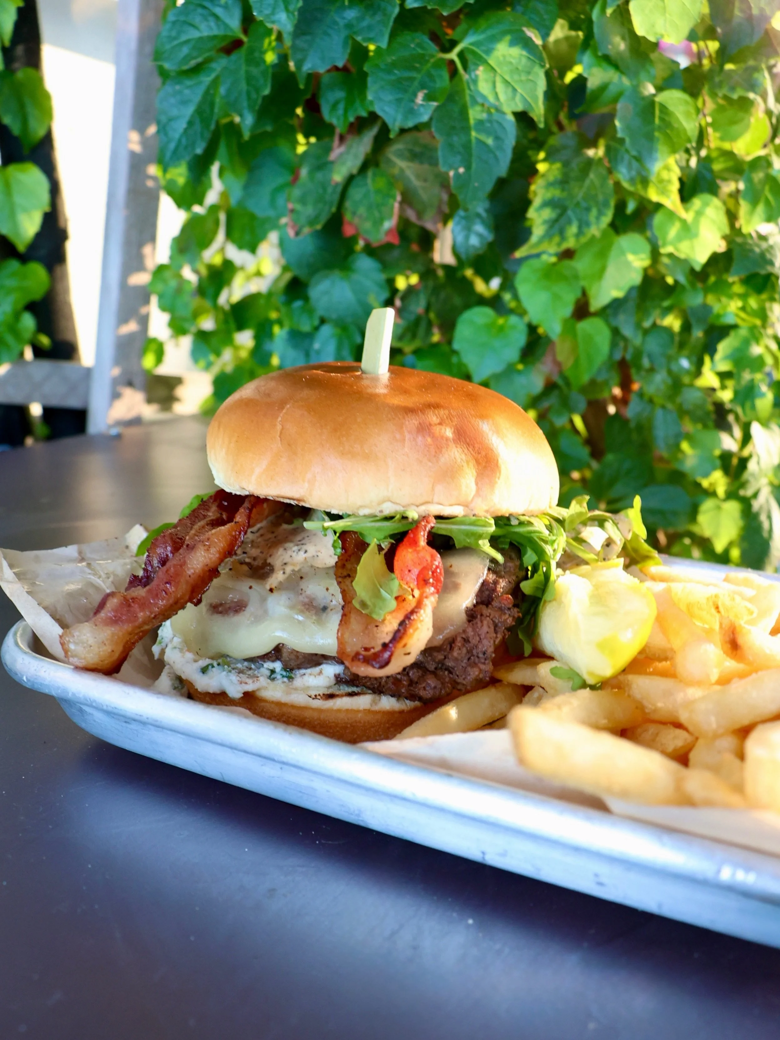 🍔 Craving something new? Our current Munchie of the Month, The Steakhouse Burger, is a delicious choice! 

🤤 Enjoy a juicy 8oz American Kobe wagyu beef patty topped with basil whipped ricotta, aged cheddar, crispy bacon, fresh arugula &amp; our hou