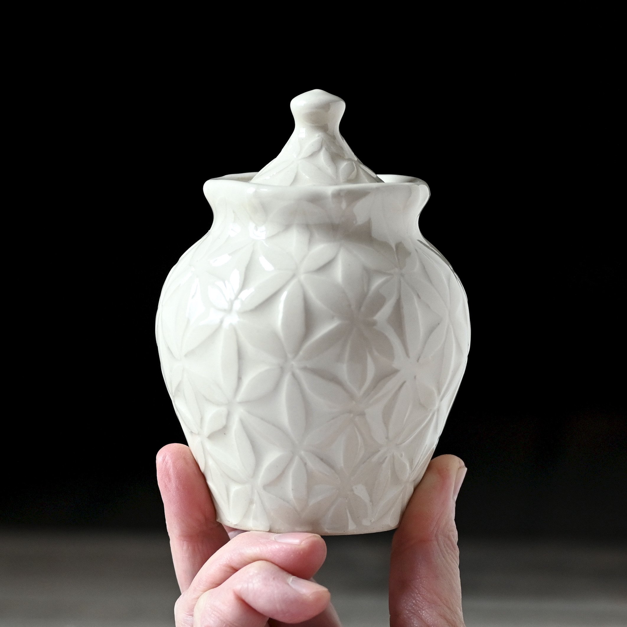 White on white patterned urn Luciaurns.JPG