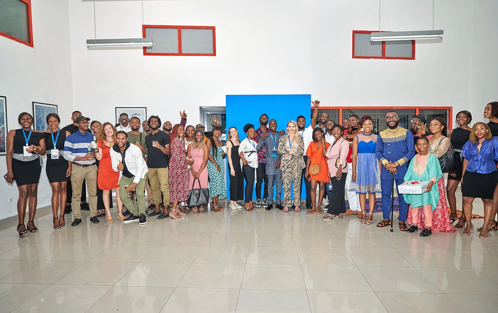 A group of people in a wide room