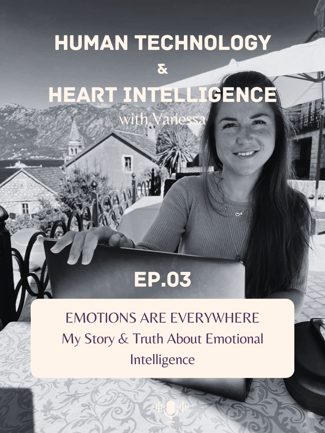 A black-and-white photo of a woman smiling at a table outdoors with a mountainous landscape in the background, advertising a podcast episode titled 'Emotions Are Everywhere' featuring Vanessa, episode 3.