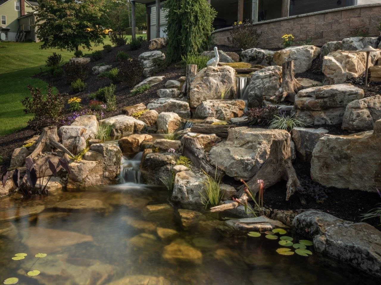 11x16 pondless waterfall with a 26 foot stream - designed and installed by Tussey Landscaping out of Hollidaysburg, PA.