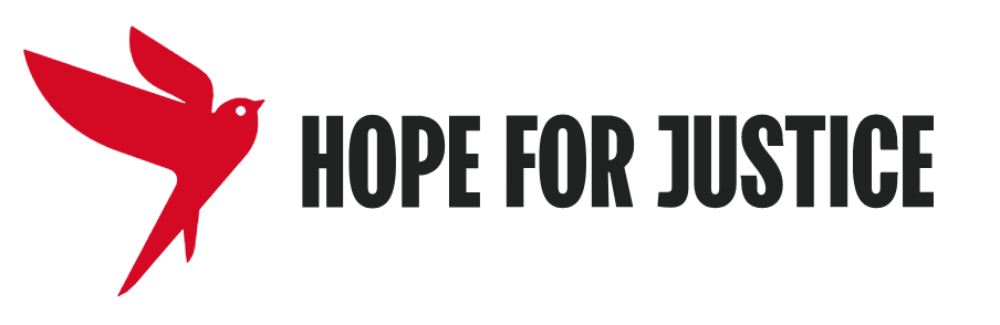 A red silhouette of a hummingbird flying near the words 'HOPE FOR JUSTICE' in bold black letters.