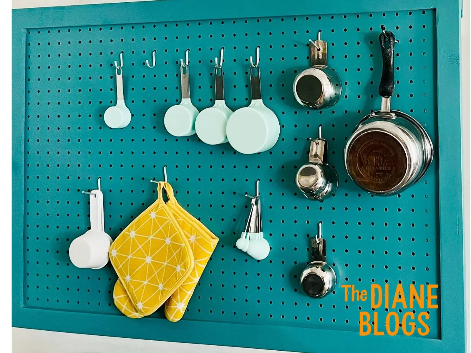 diy pegboard with pots and pans