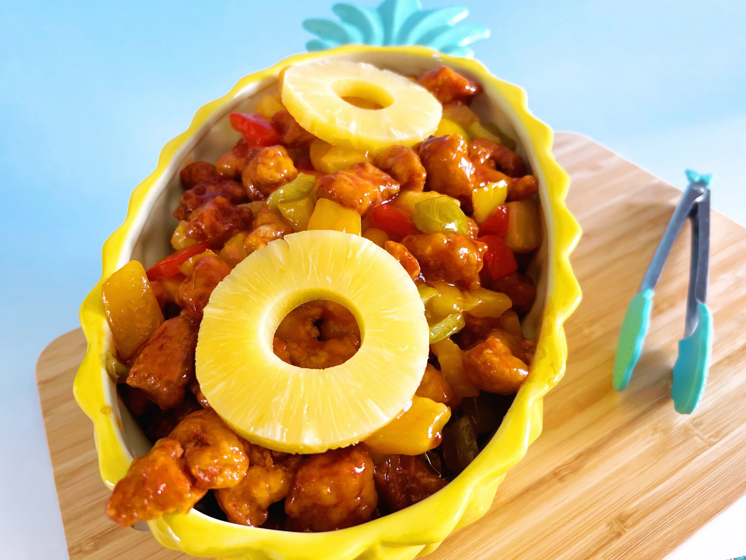 sweet and sour pork in pineapple dish
