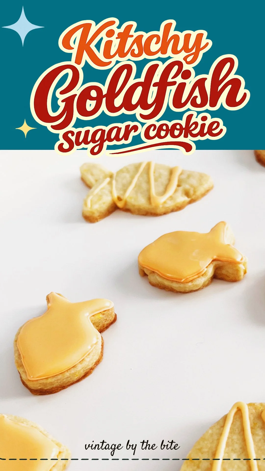 Goldfish-shaped cut-out sugar cookies decorated with vintage-style orange icing, shown beneath a retro title reading “Kitschy Goldfish Sugar Cookie.”