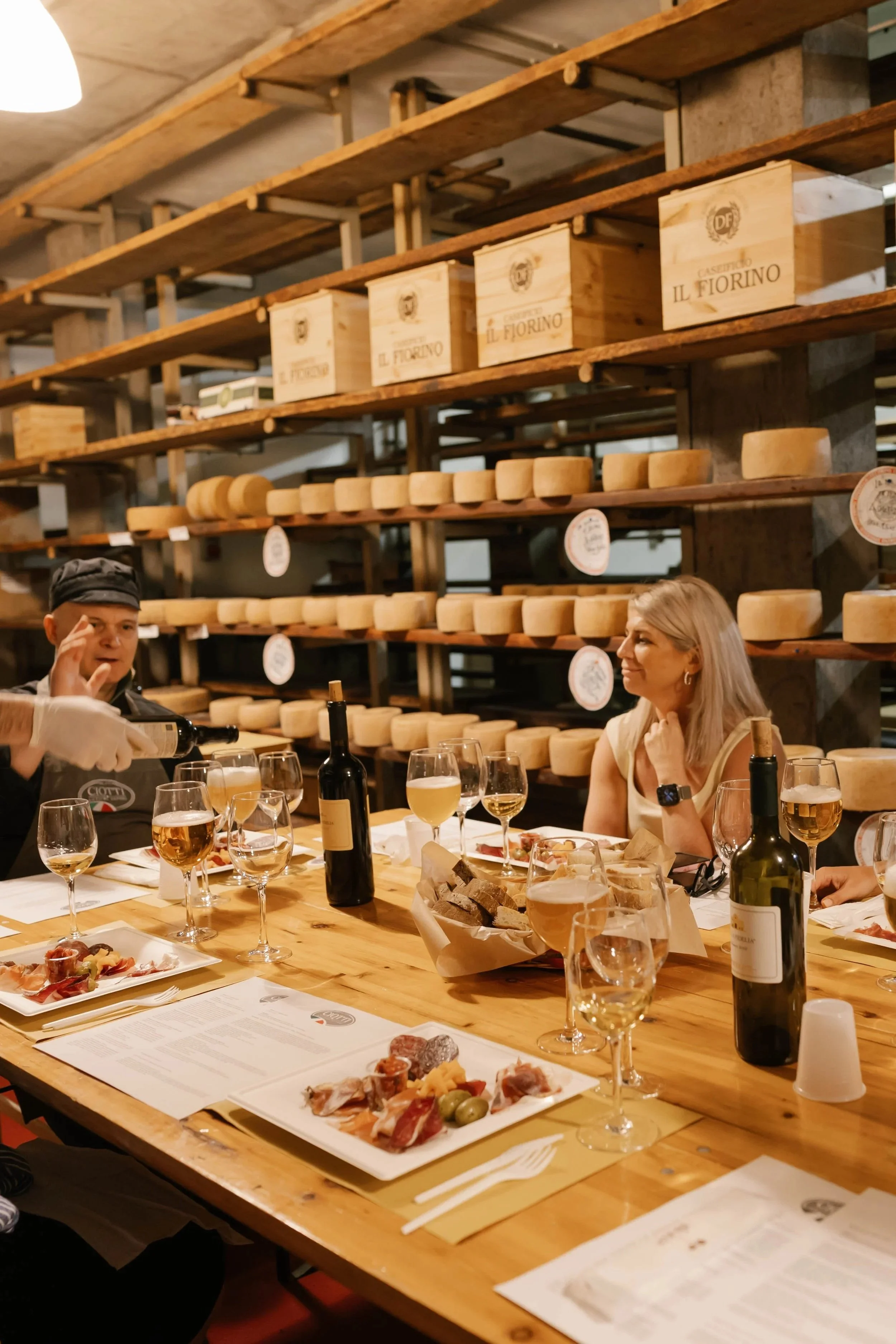 An afternoon in the aging caves of a third-generation cheese and butcher shop, learning how time, tradition, and craftsmanship shape every wheel and cut, all enjoyed alongside the local wines that bring it to life.