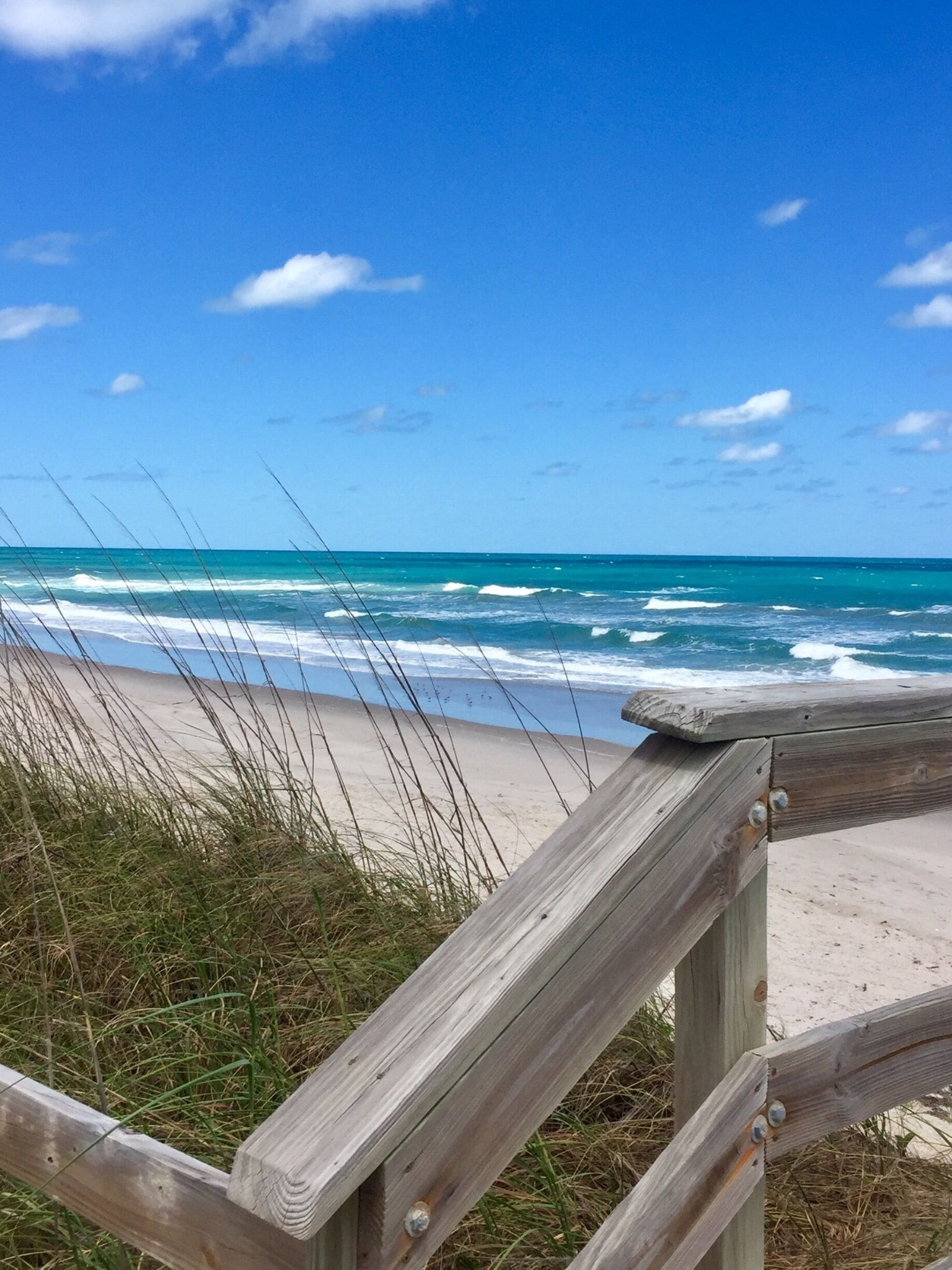 Beach access boardwalk overlooking the Atlantic Ocean in Melbourne Beach Florida on the Space Coast