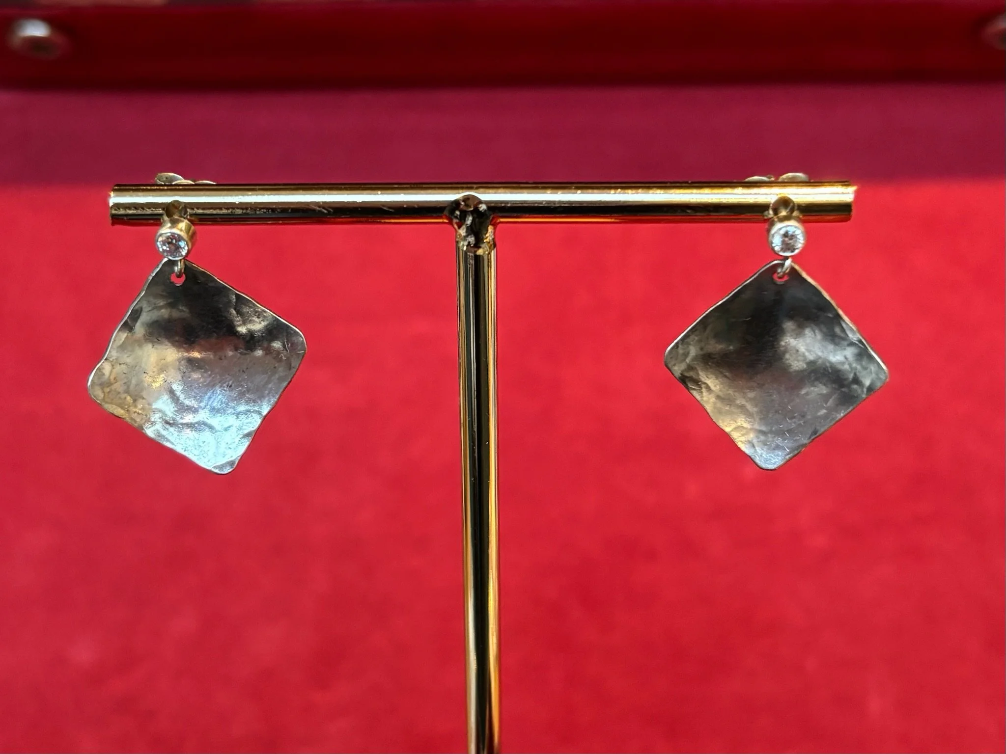 Blue topaz stud earrings with hammered silver square drop