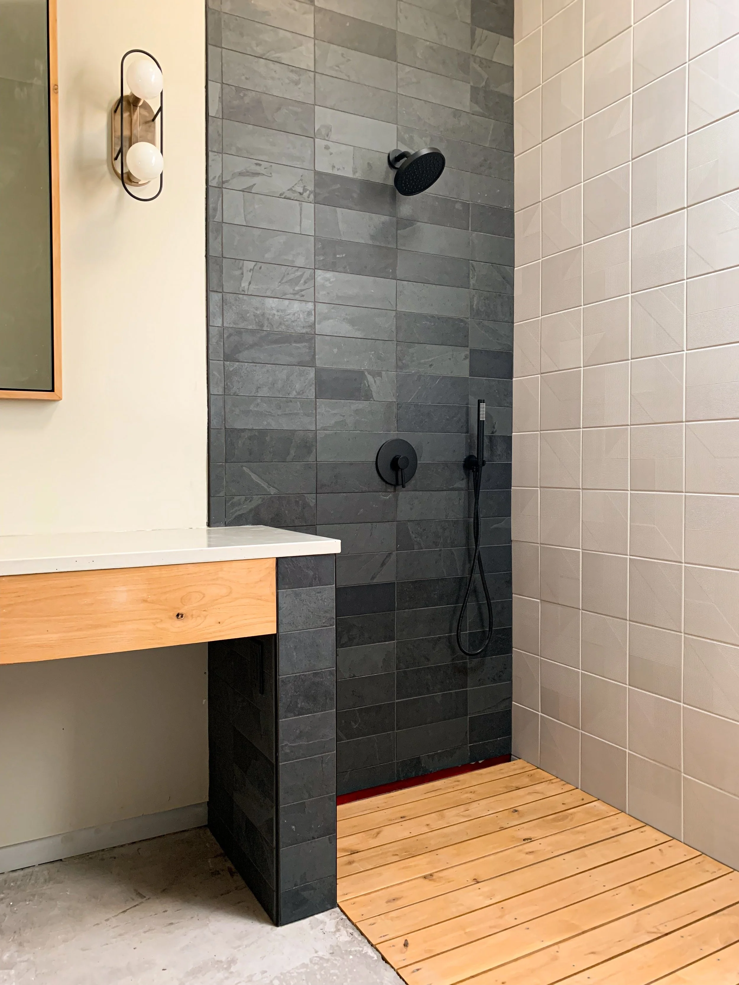 modern and custom interior design of bathroom for vacation rental use by design build firm in joshua tree for vacation home design