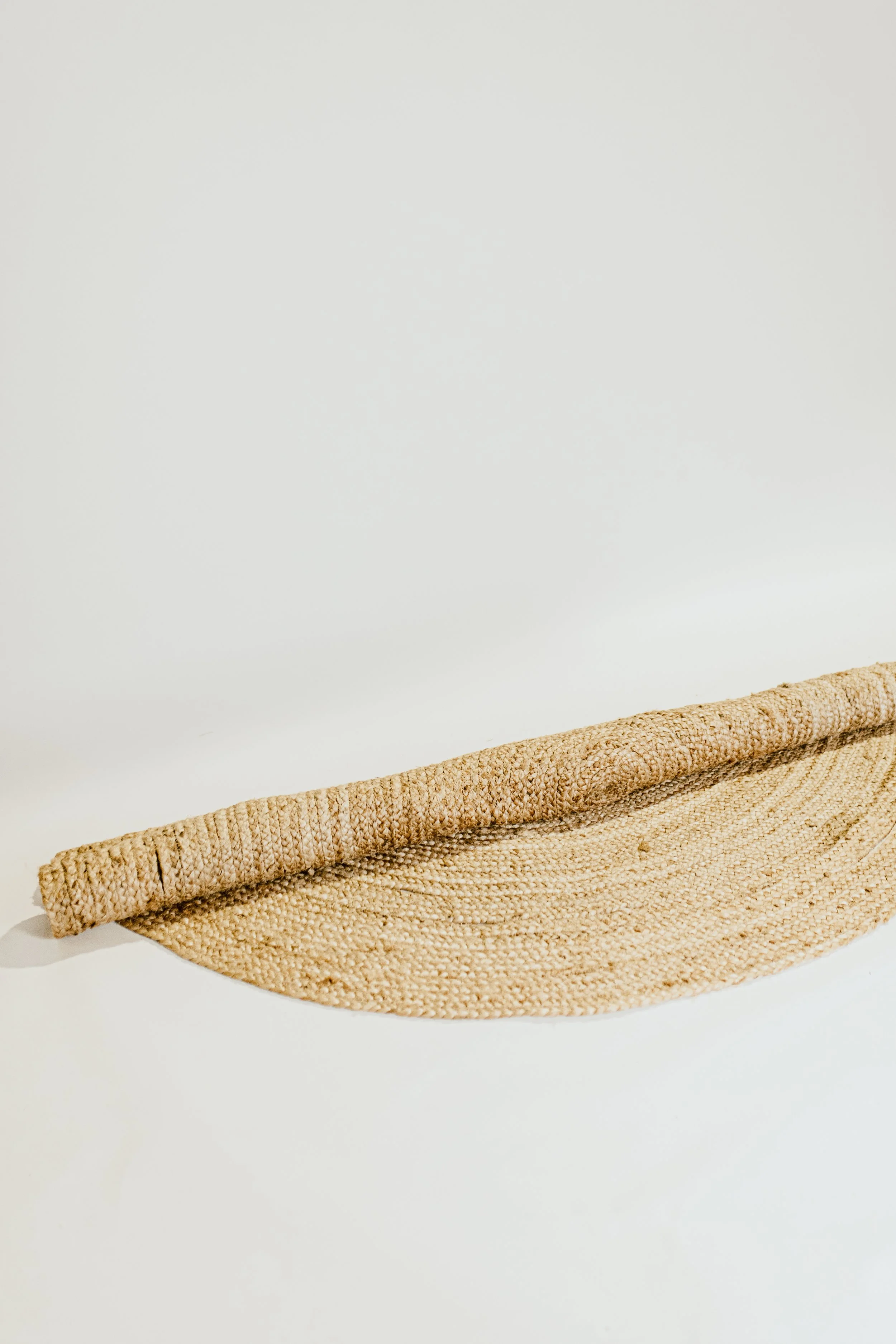 Hire: Amara Round Rug — MAIN EVENT WEDDINGS