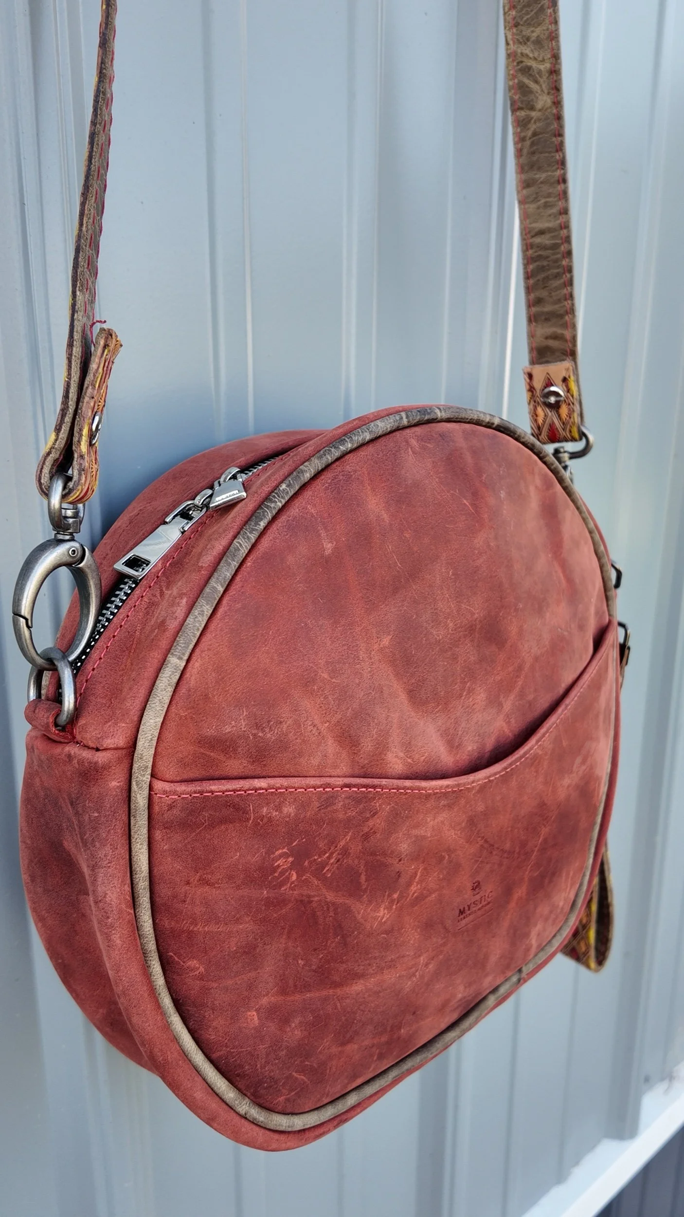 red leather canteen round crossbody western bag back pocket