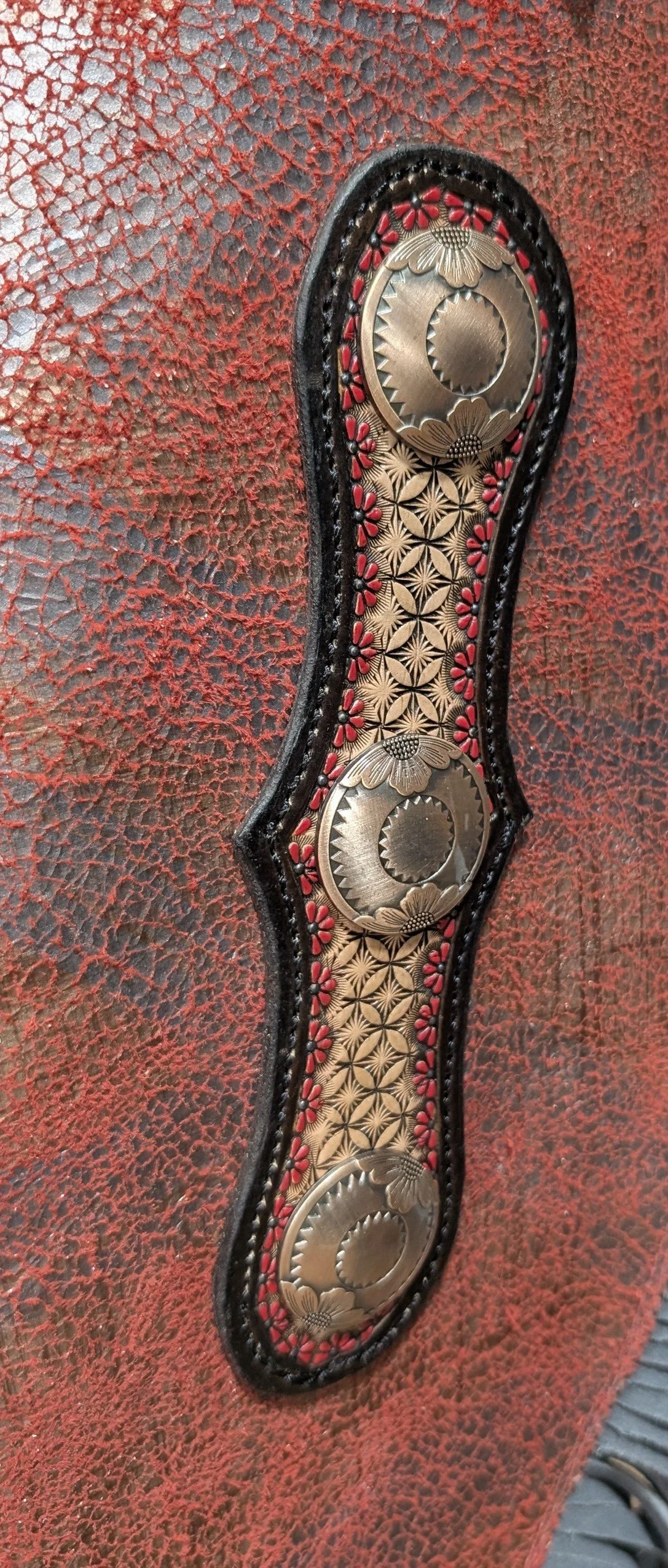 tooled leather chinks chaps conchos.jpg