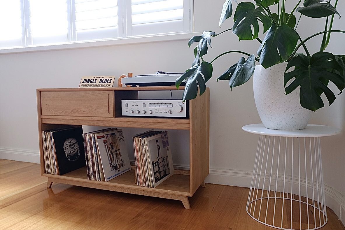Record Console⠀
⠀
1150x450x700⠀
⠀
Made from solid American Oak. This cabinet has two upper spaces divided by a sliding door, a slot in the top for your heavy rotation and enough room below to store around 260 records. ⠀
⠀
Custom sizing available. ⠀
⠀