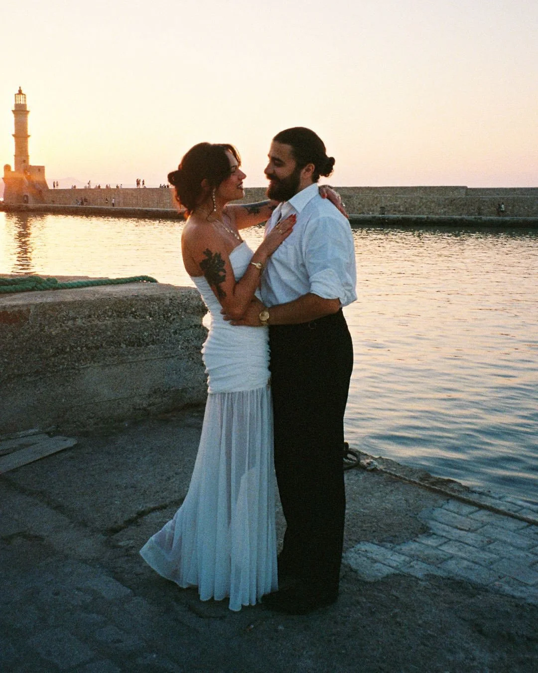 The sun dips and the welcome party begins. The night before Sophia &amp; Yanni&rsquo;s wedding in Crete, photographed on 35mm film 🇬🇷