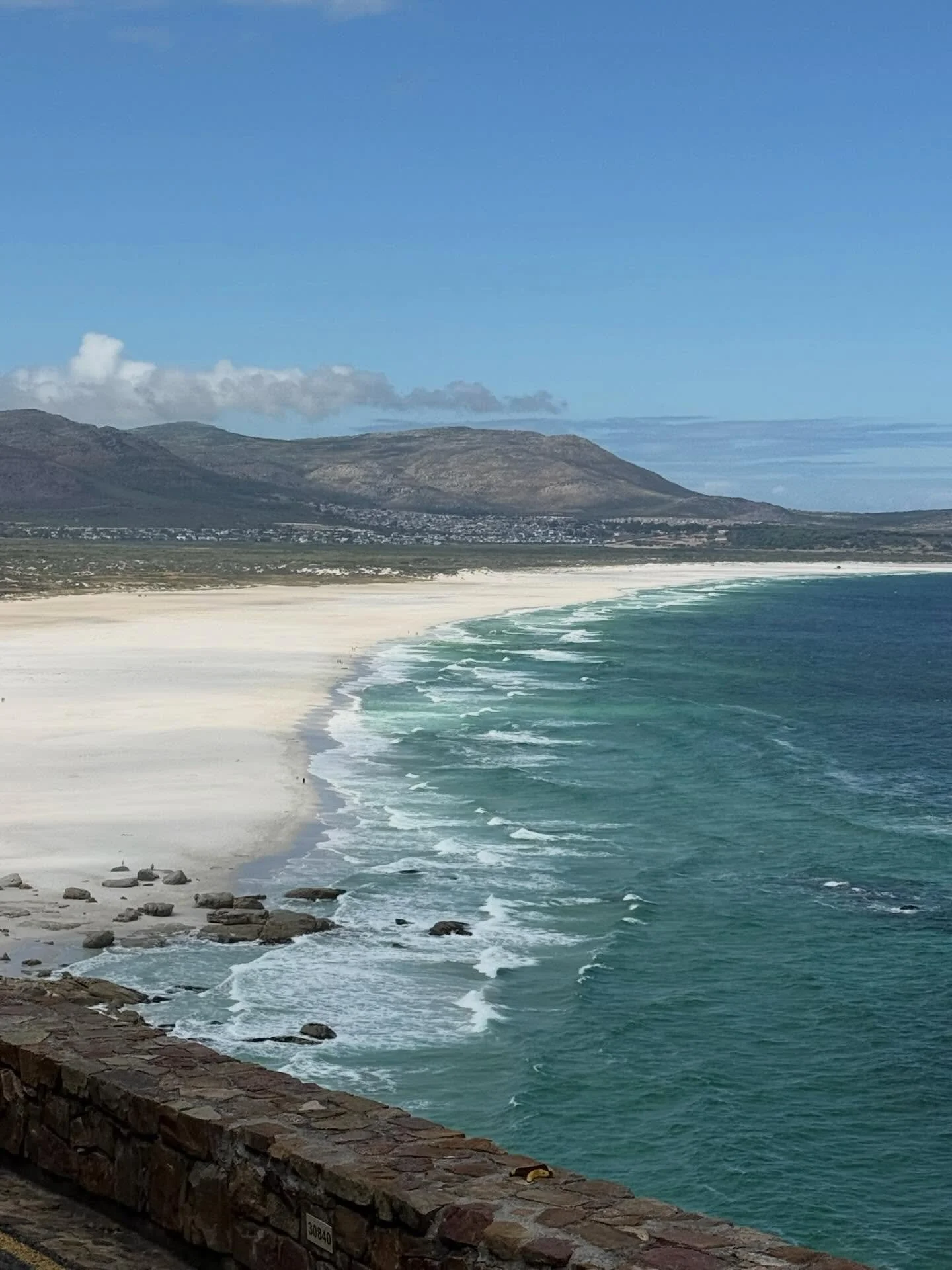 Cape Town was the last and final stop on this epic African adventure and what a way to end it! 

We watched penguins waddle along the sand at Boulders Beach, stood on top of Table Mountain taking in views that truly do not feel real, and made our way