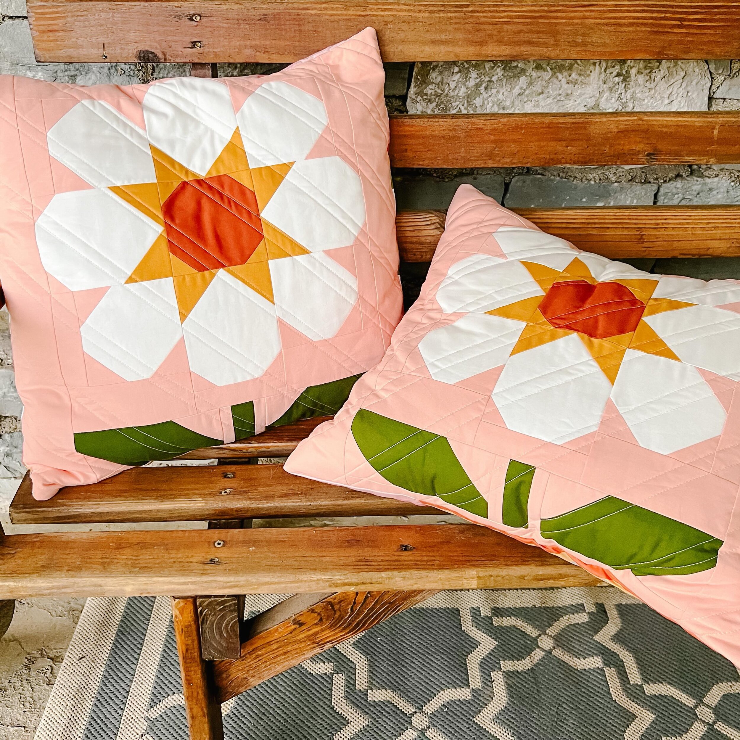 Daisy Mae is here! 

And these happy pillows are perfect to brighten the gloomy, cloudy day we are having. TN is experiencing one of our &ldquo;little winters&rdquo; currently with cloudy skies, wind and cooler temps. These are luckily 2 flowers I wo