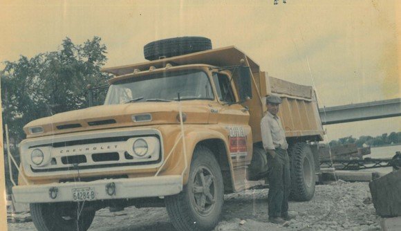  Peter Hutton standing next to a truck while in the construction trade.  